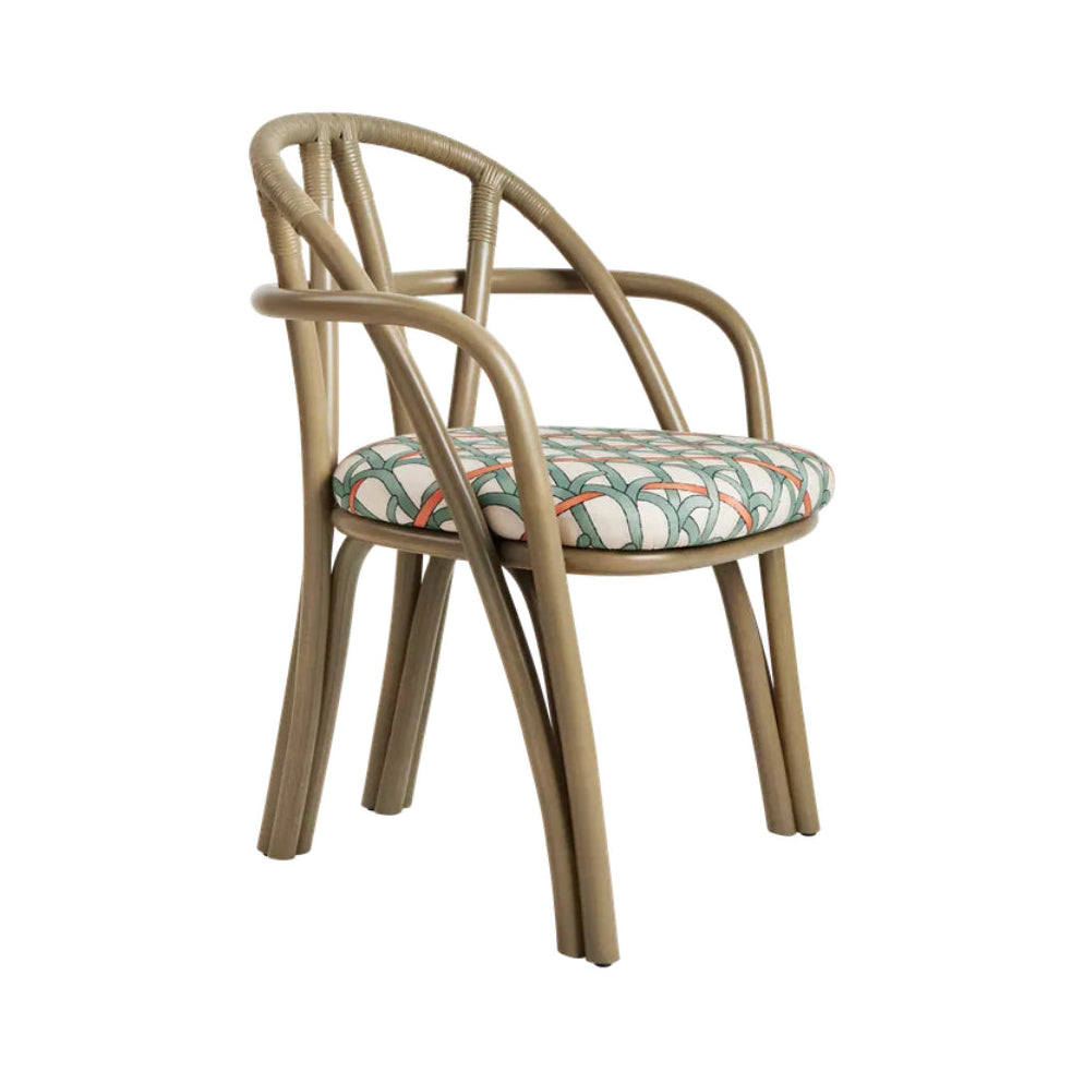 Čalouněné křeslo BISTRA s olivovým ratanovým podstavcem