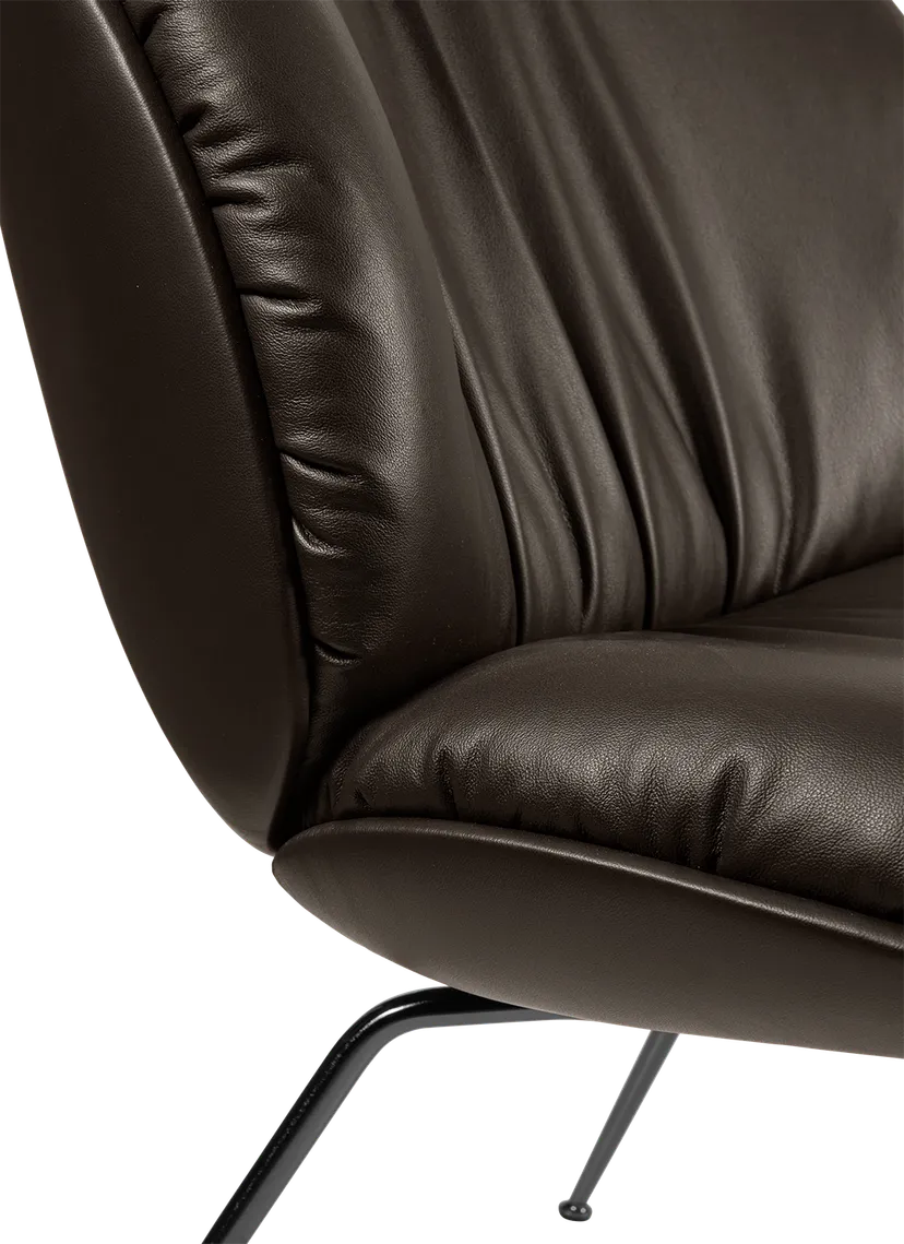 BEETLE SOFT upholstered armchair with a black base