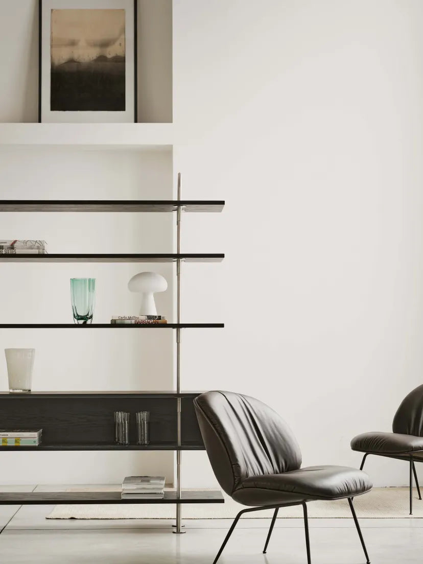 BEETLE SOFT upholstered armchair with a black base