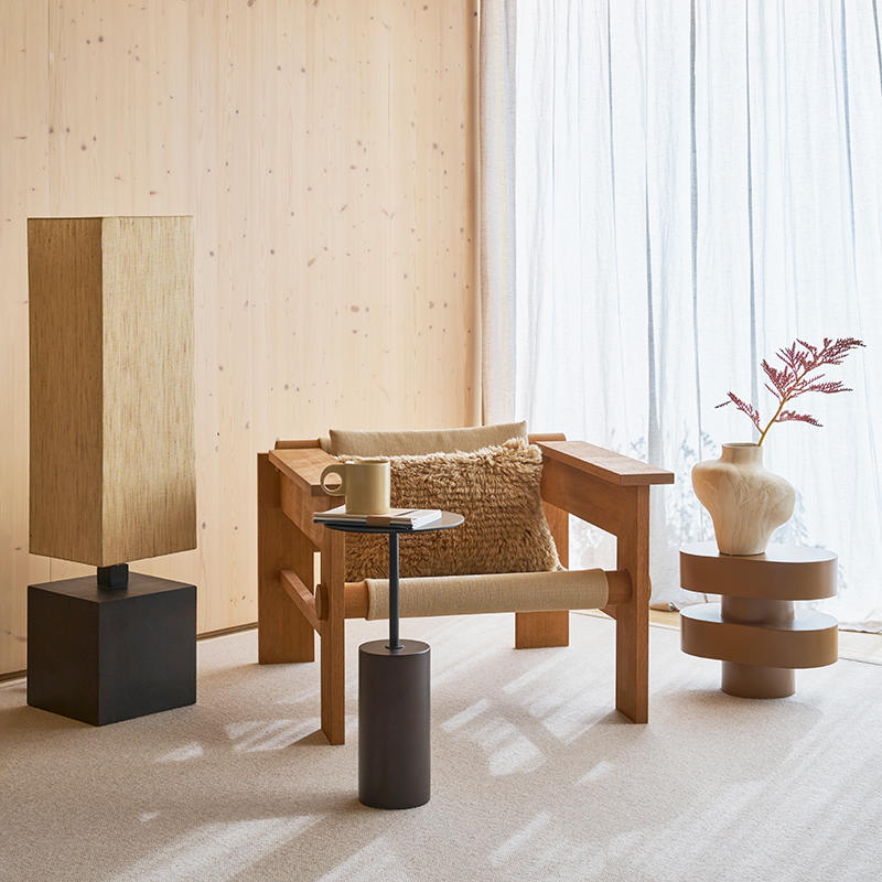 Macy side table and a black top with a wooden base