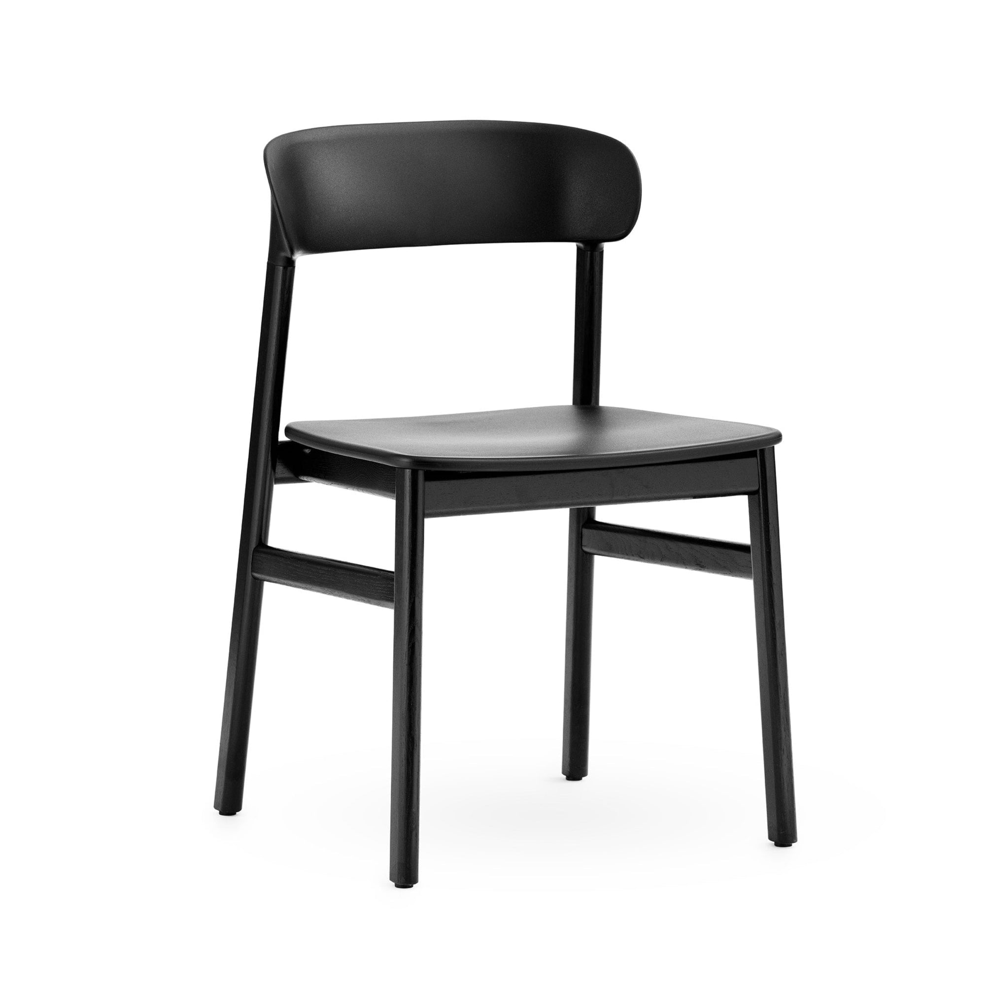 Herit black chair with a black oak base