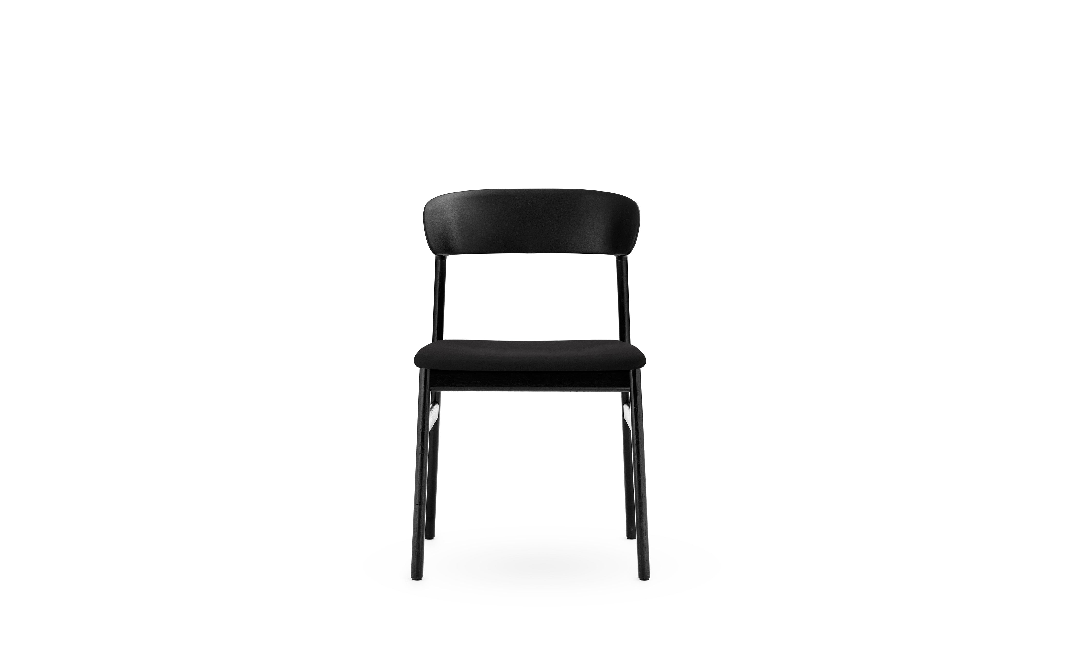 Herit upholstered chair with a black oak base