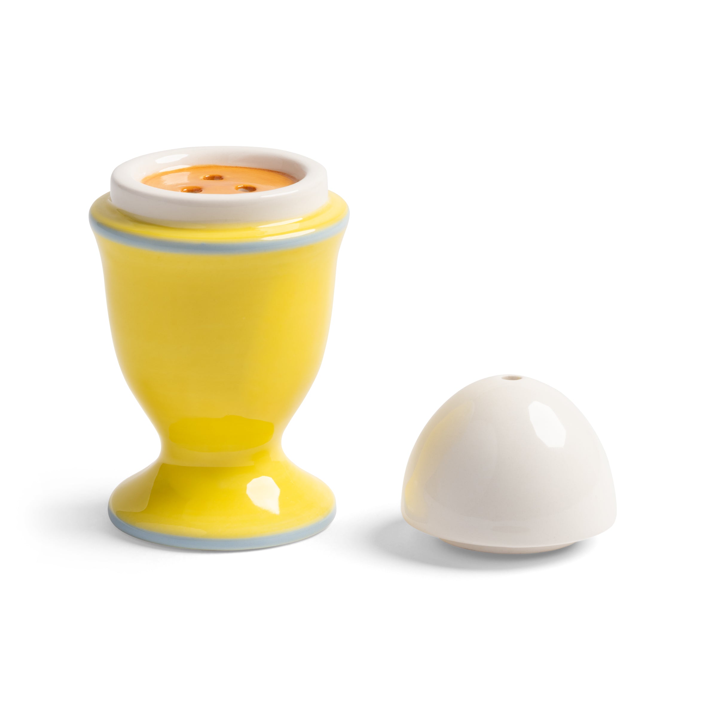 Egg-shaped salt and pepper shakers in yellow with blue and white