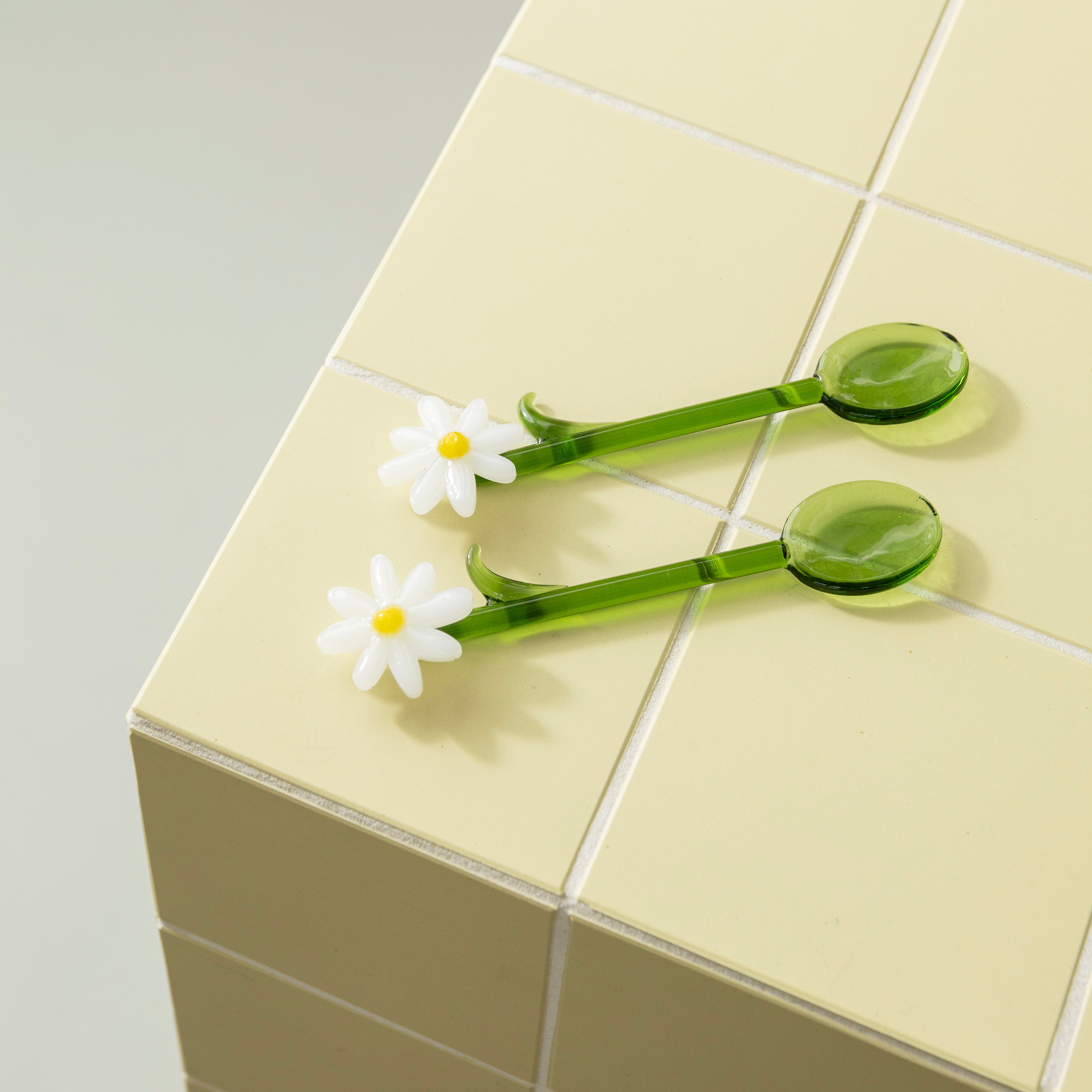 FLORA green and white teaspoons