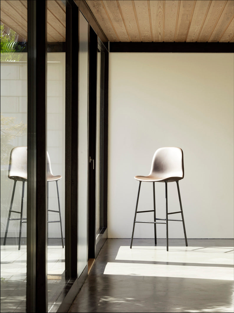 Bar chair upholstered forms with a blue base