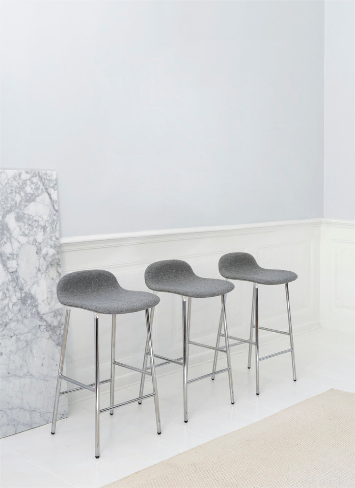 Upholstered forms with a golden base