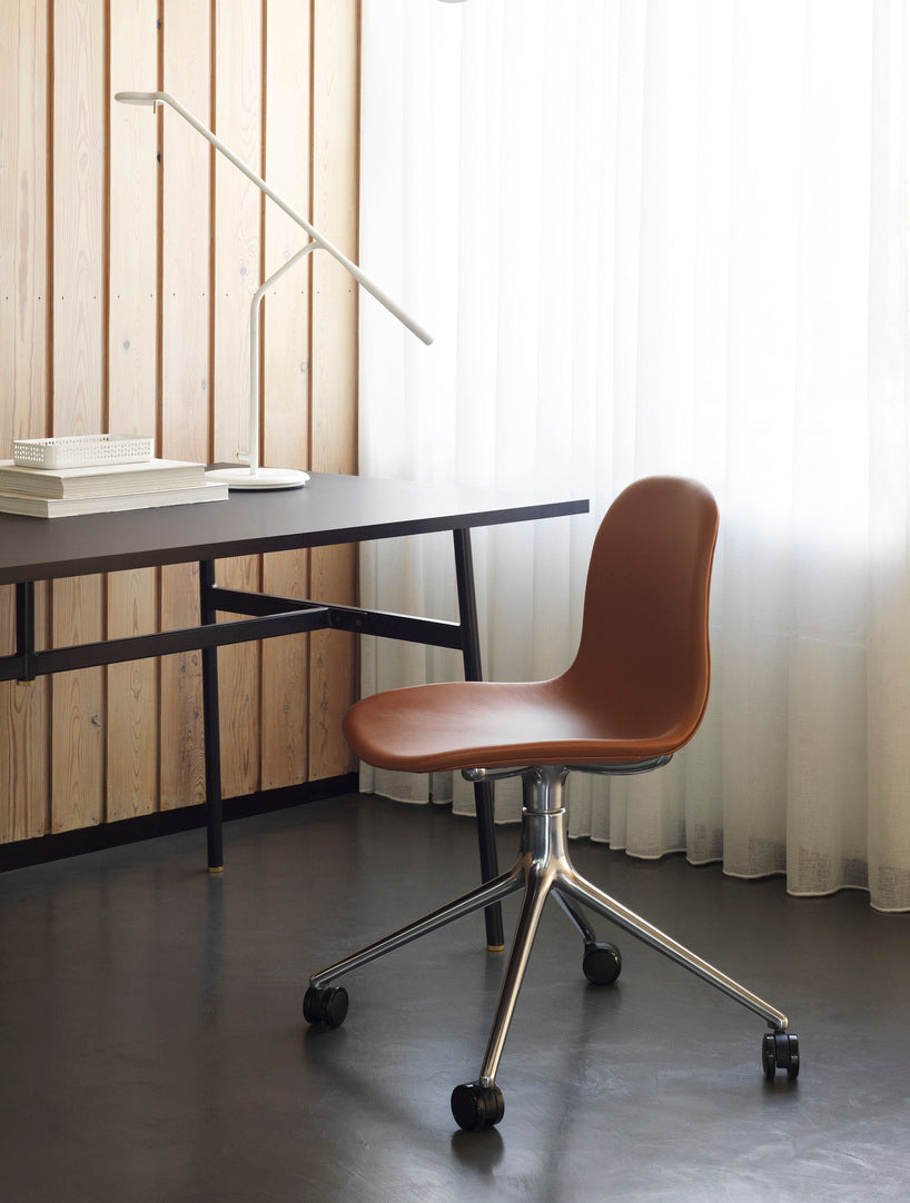 4W green office chair with an aluminum base on wheels