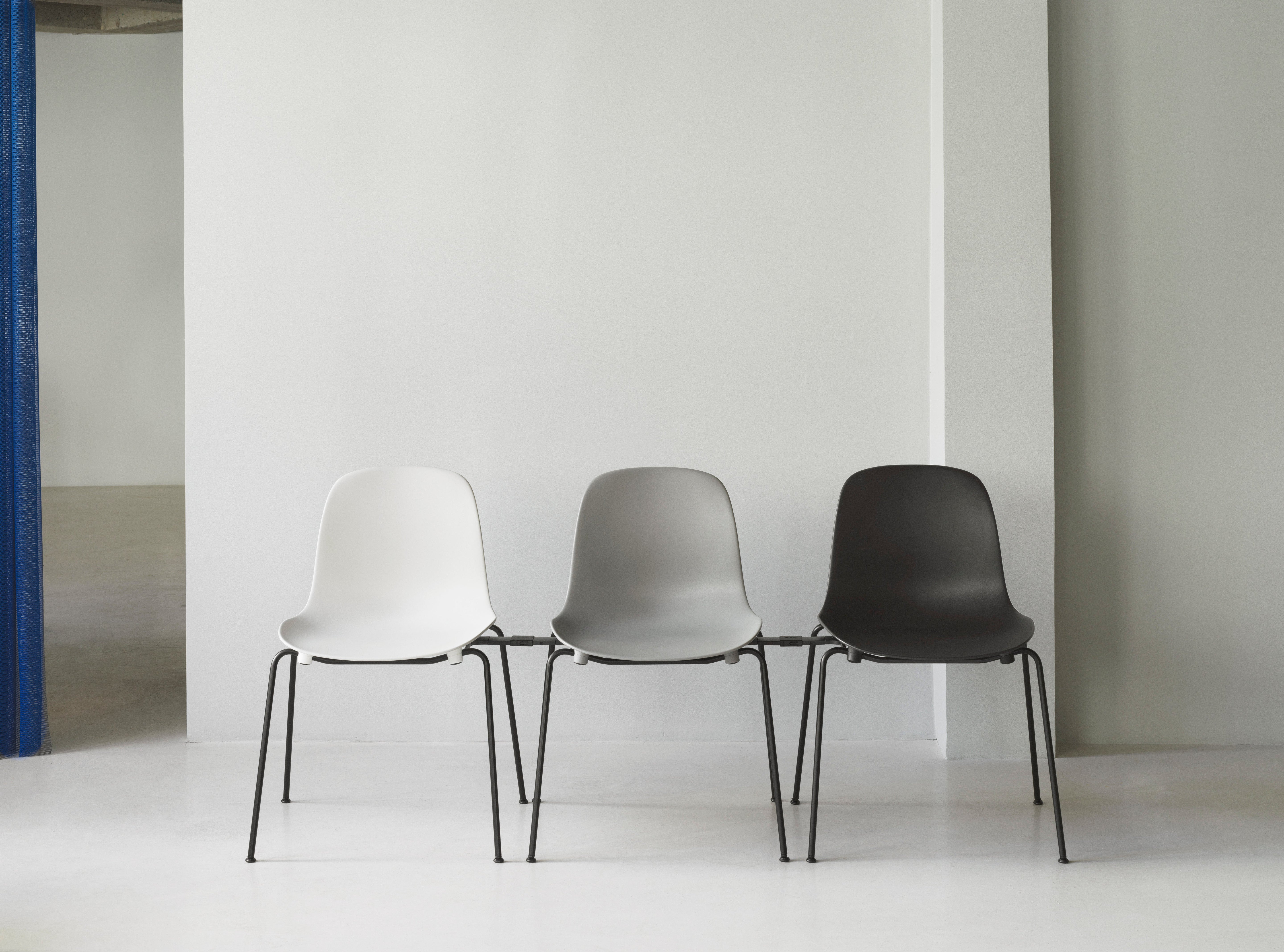 Chair of forms stacking warm gray with a black base