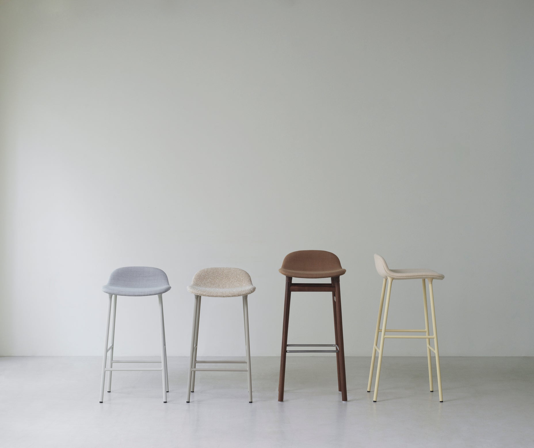 Upholstered forms with a golden base