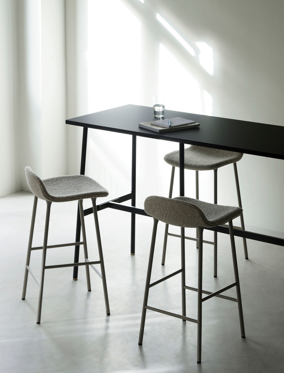 Upholstered forms with a golden base