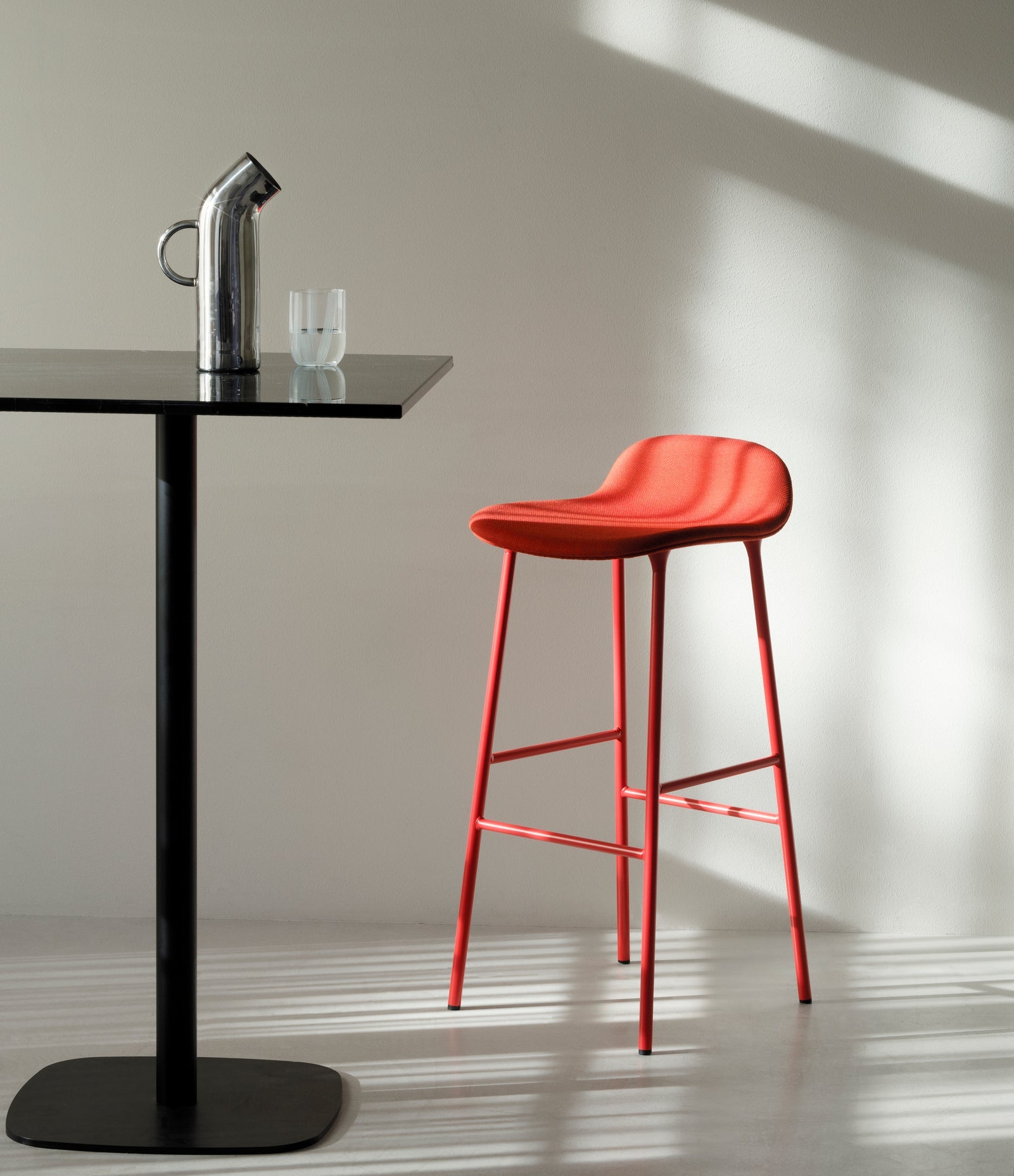 Upholstered forms with a golden base