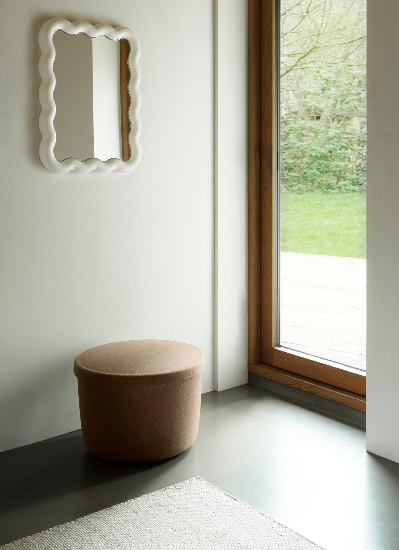 Pouf with a storage of hide sand