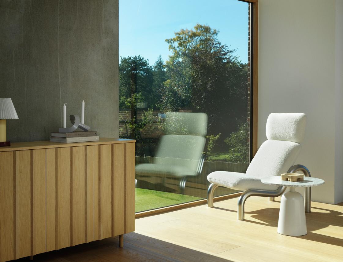 Upholstered armchair tube steel base