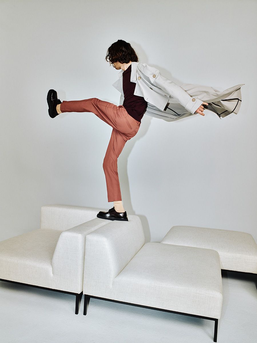 HOLDEN upholstered pouf with black base