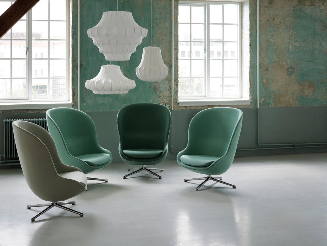 HYG HIGH armchair with an aluminum adjustable base