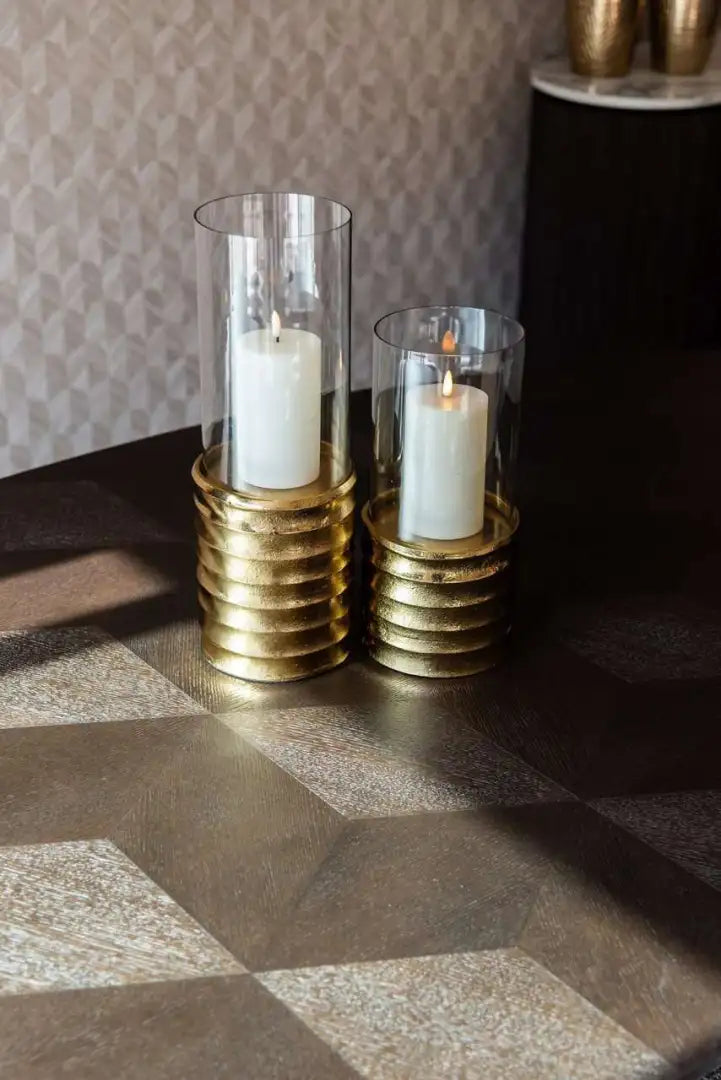 LUXOR brown oval table with a gold base