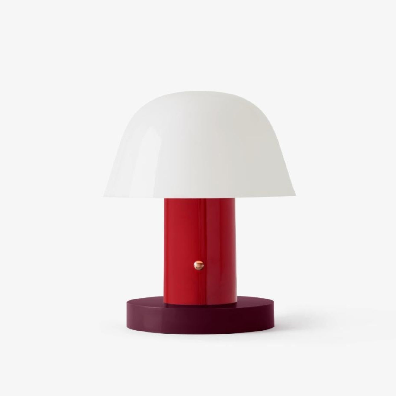 Přenosná lampa SETAGO JH27 s krémovým stínidlem a tmavě červeným podstavcem.