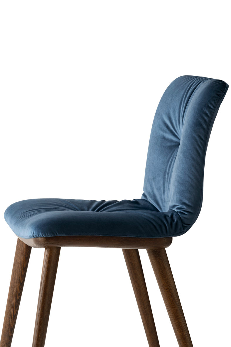 ANNIE SOFT upholstered chair with a dark wooden base