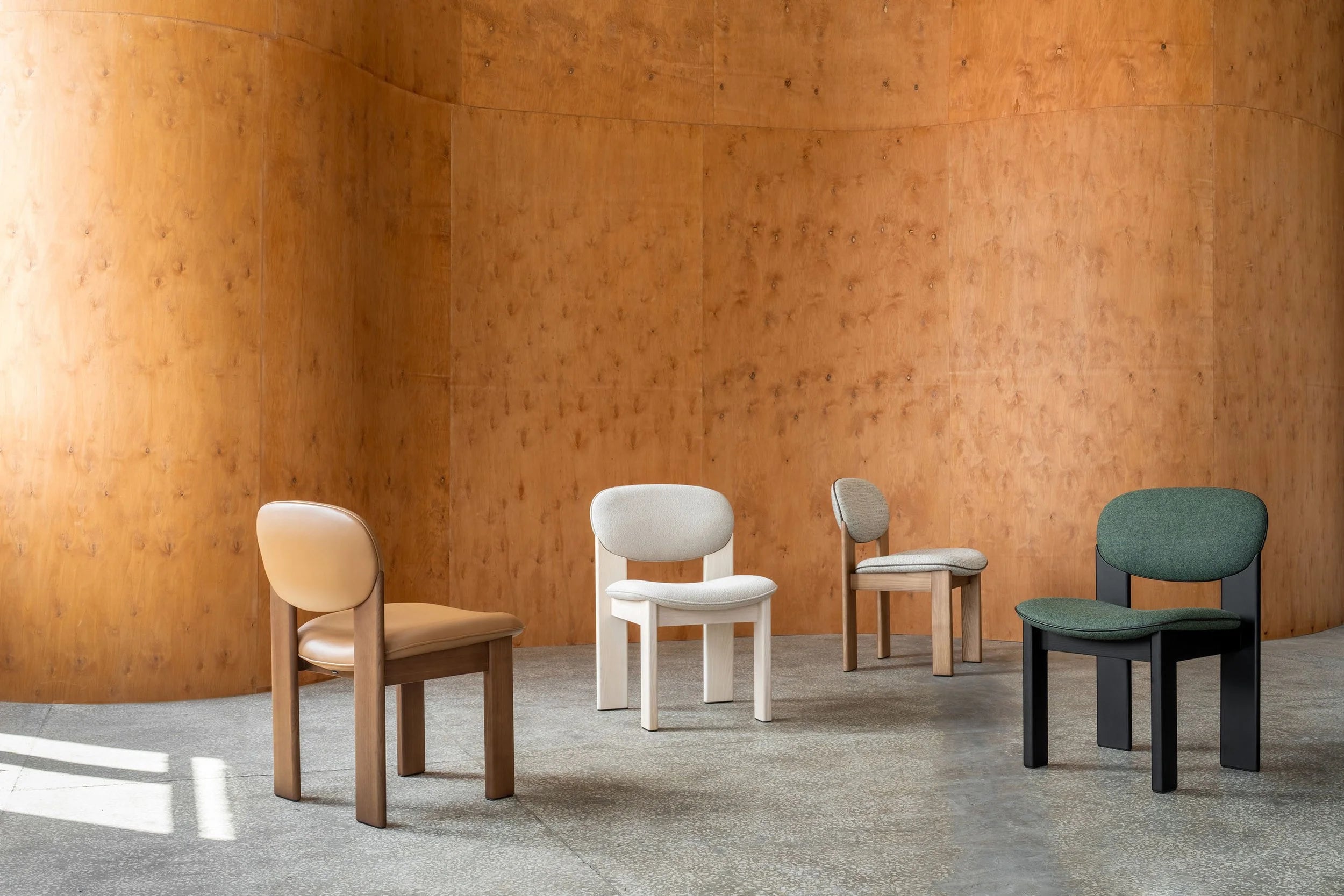 ARCHIPEN upholstered chair with a brown ash base