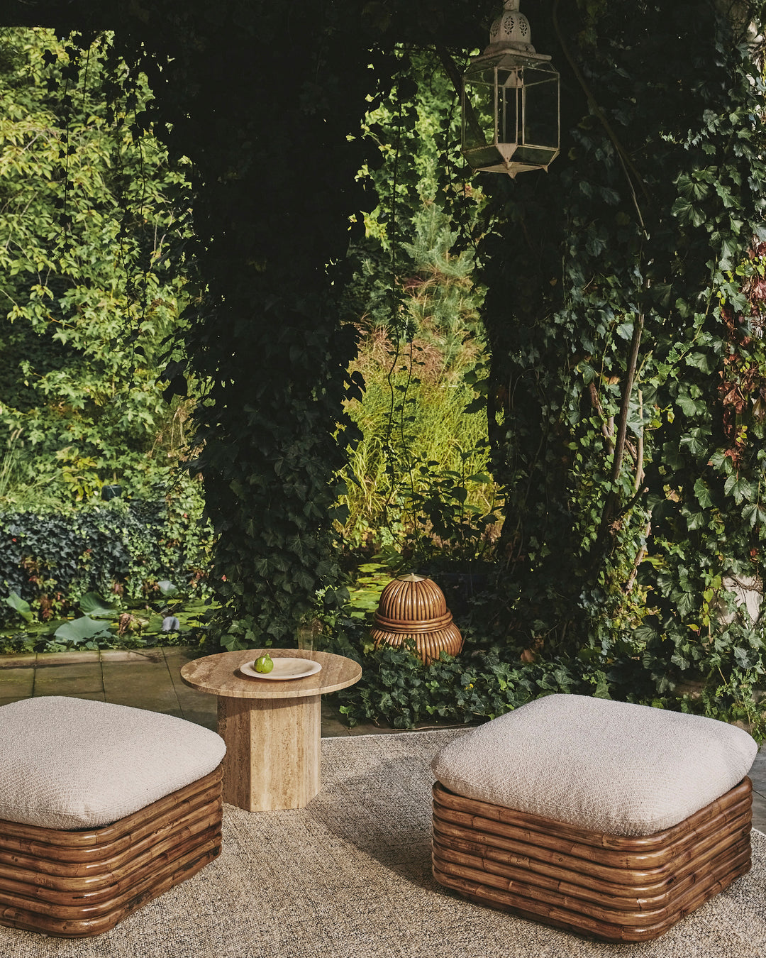 Bohemian Puff 72 upholstered with a rattan base