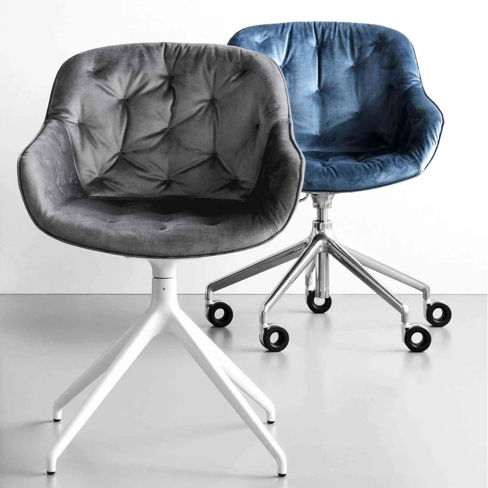 IGLOO upholstered quilted swivel chair with black base