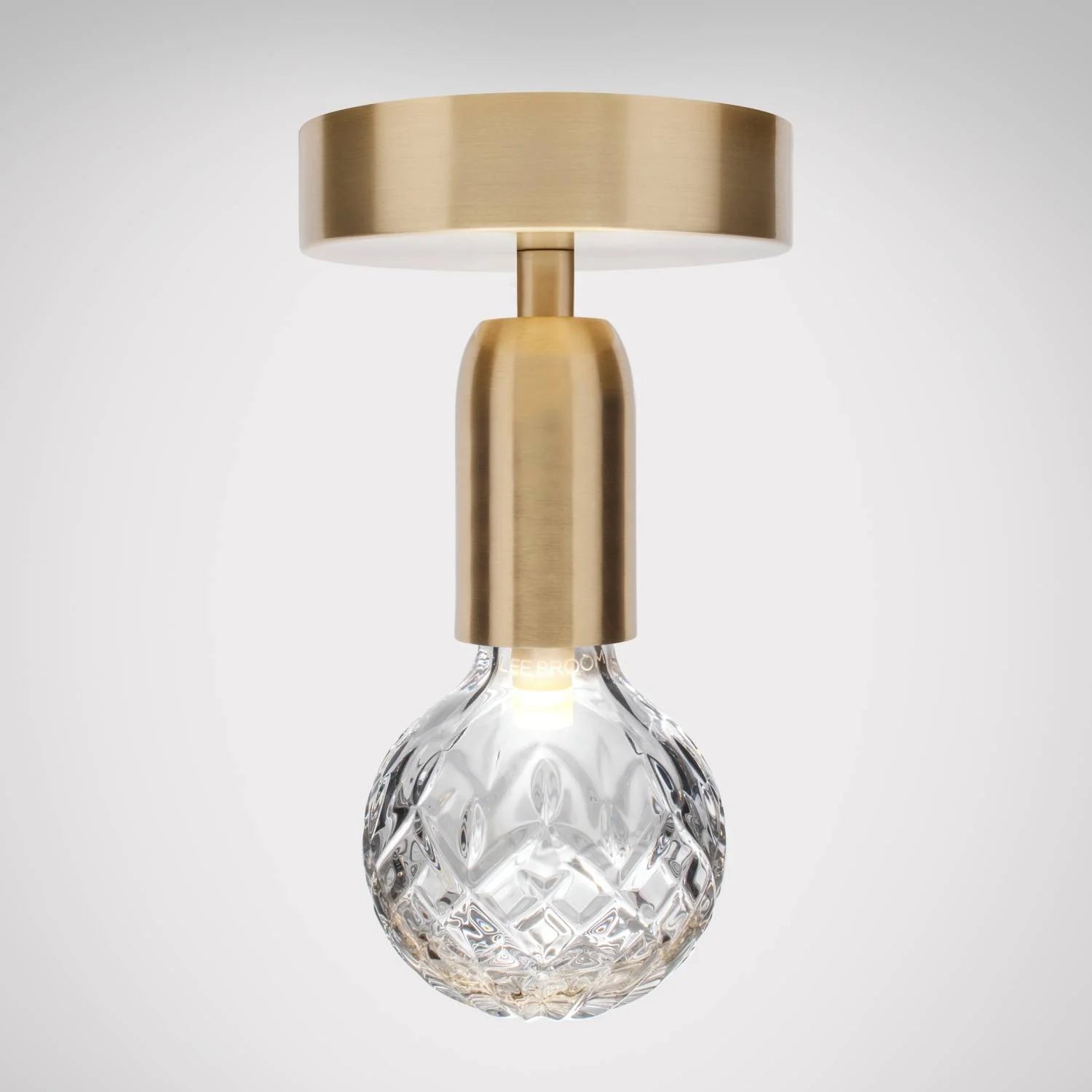 Lustrná lampa CRYSTAL BULB z křišťálového skla s mosazným povrchem