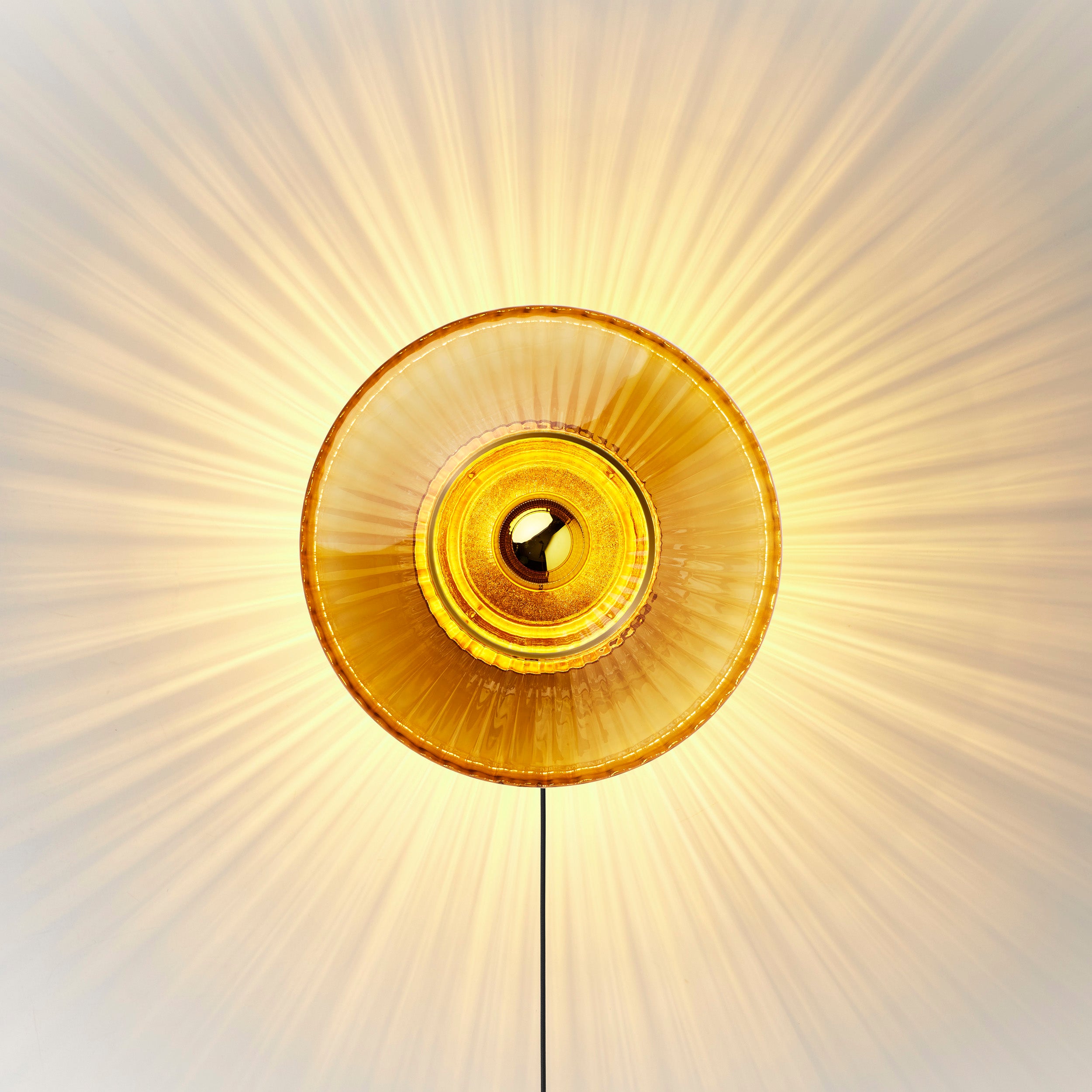 NEW WAVE OPTIC amber transparent wall lamp