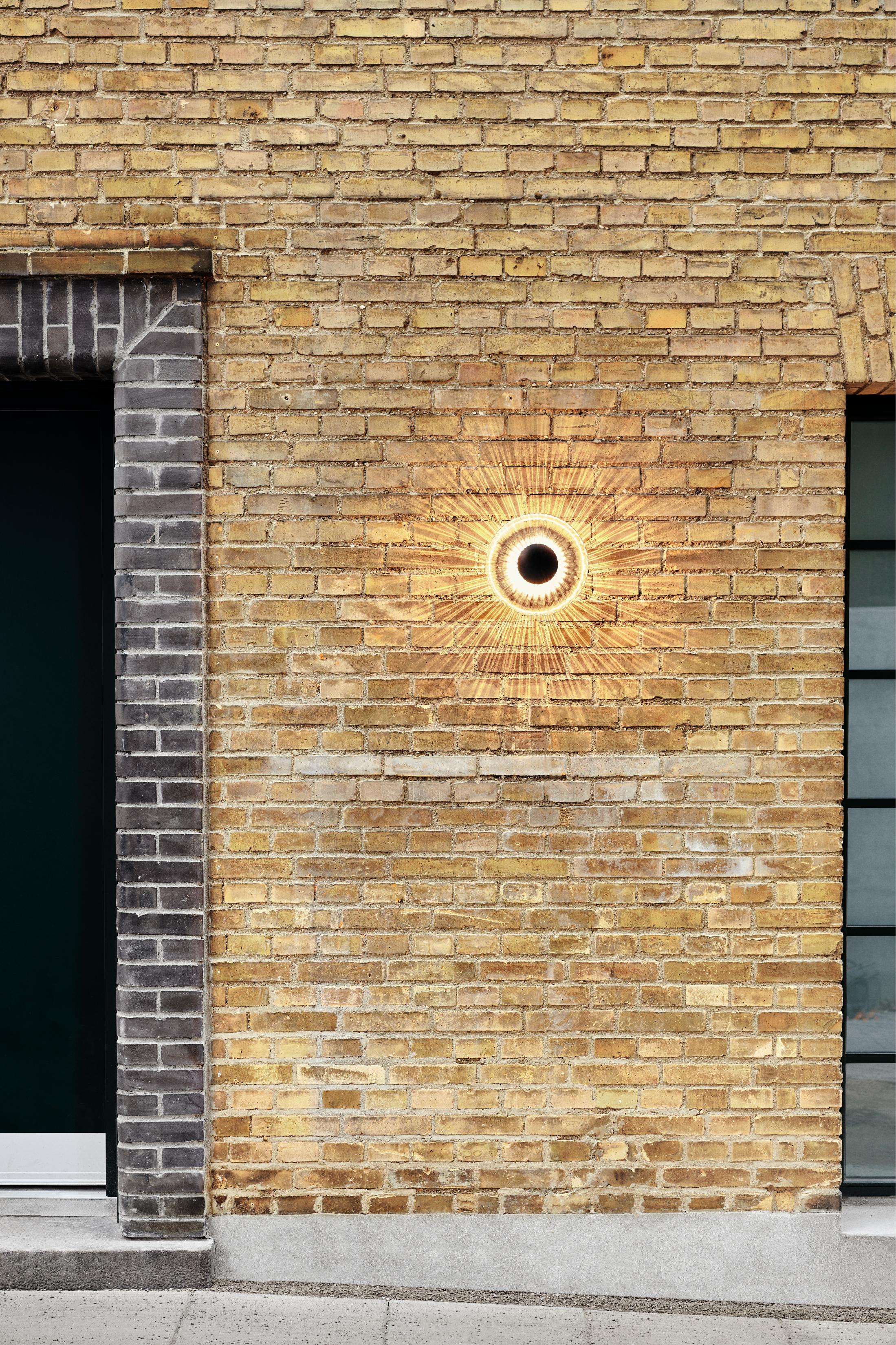 NEW WAVE OPTIC transparent outdoor wall lamp with black finish