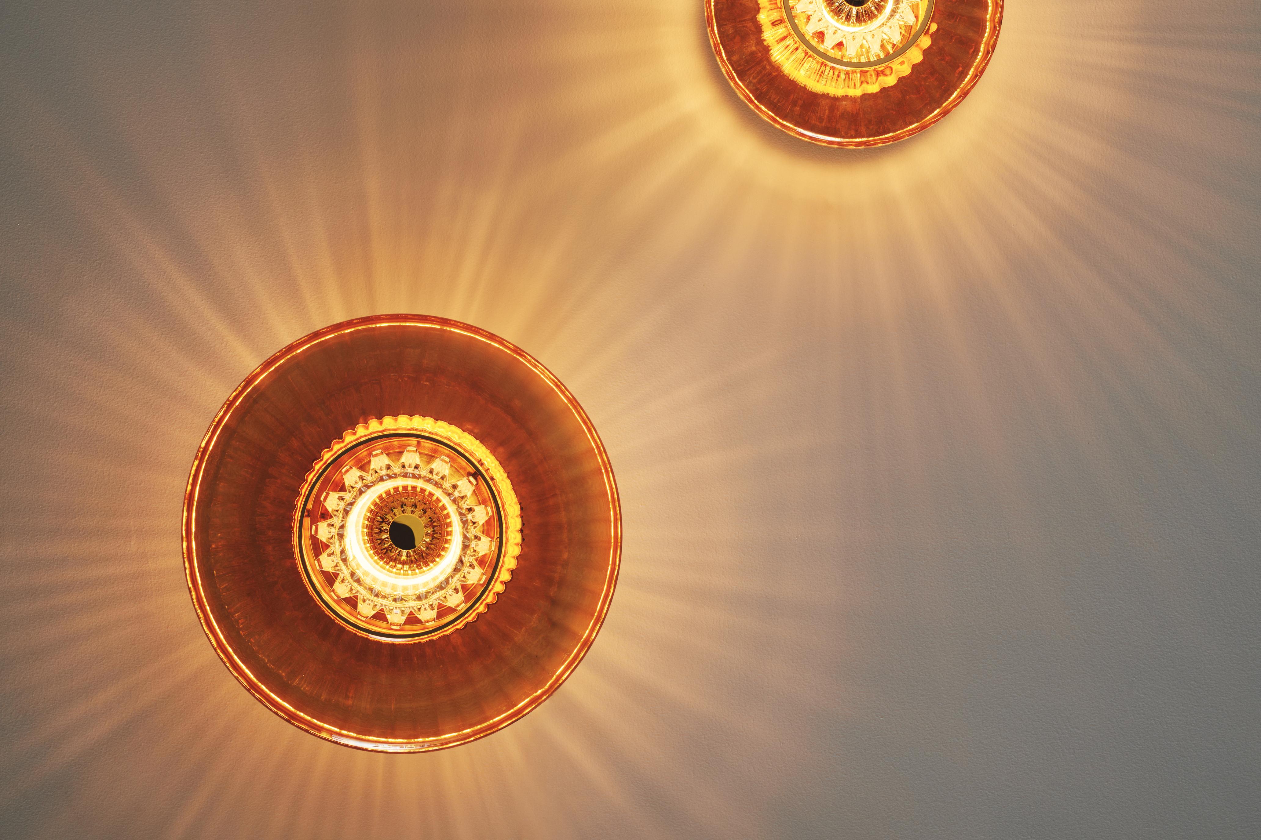 NEW WAVE OPTIC amber transparent wall lamp