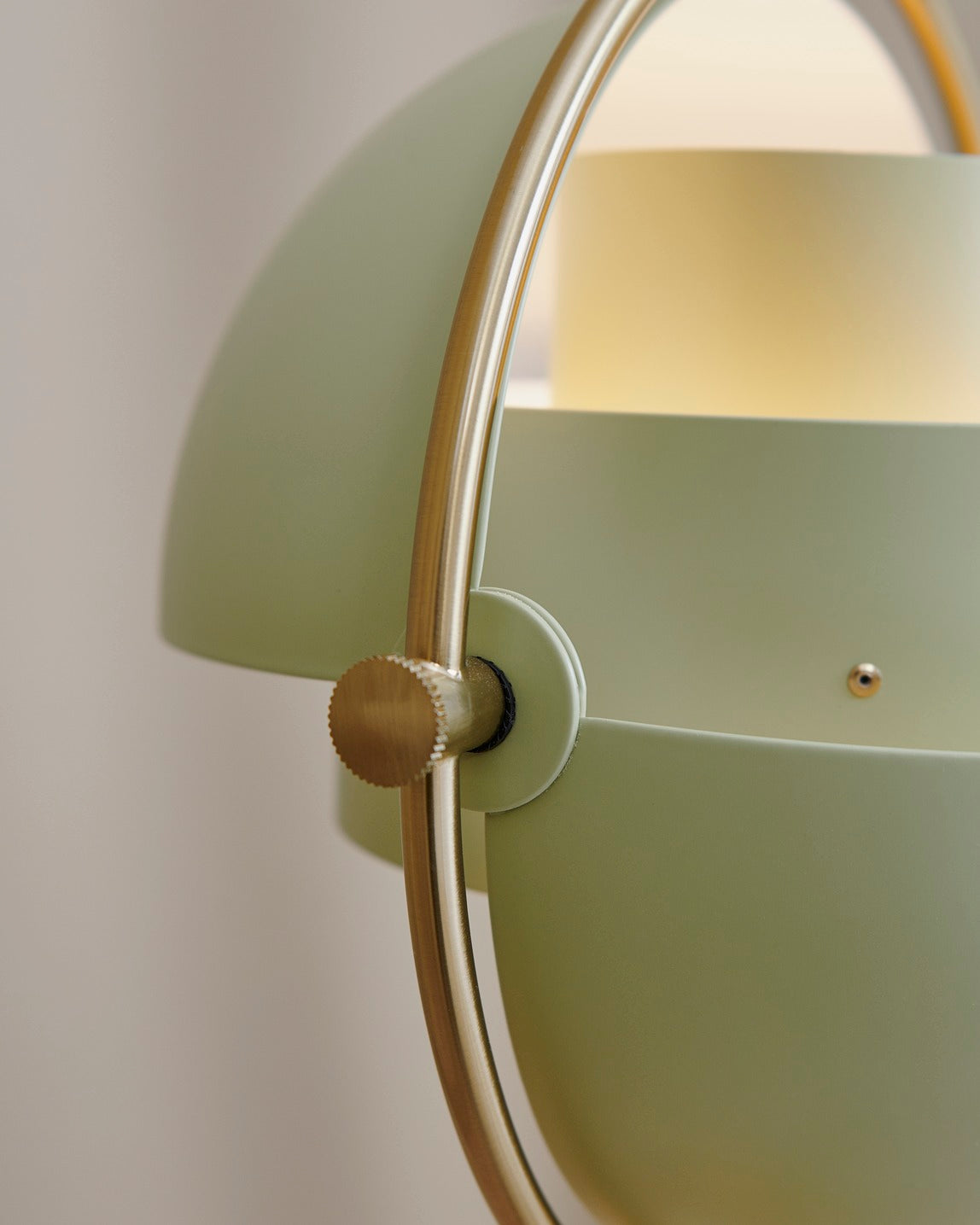 MULTI-LITE table lamp in light green with a brass base