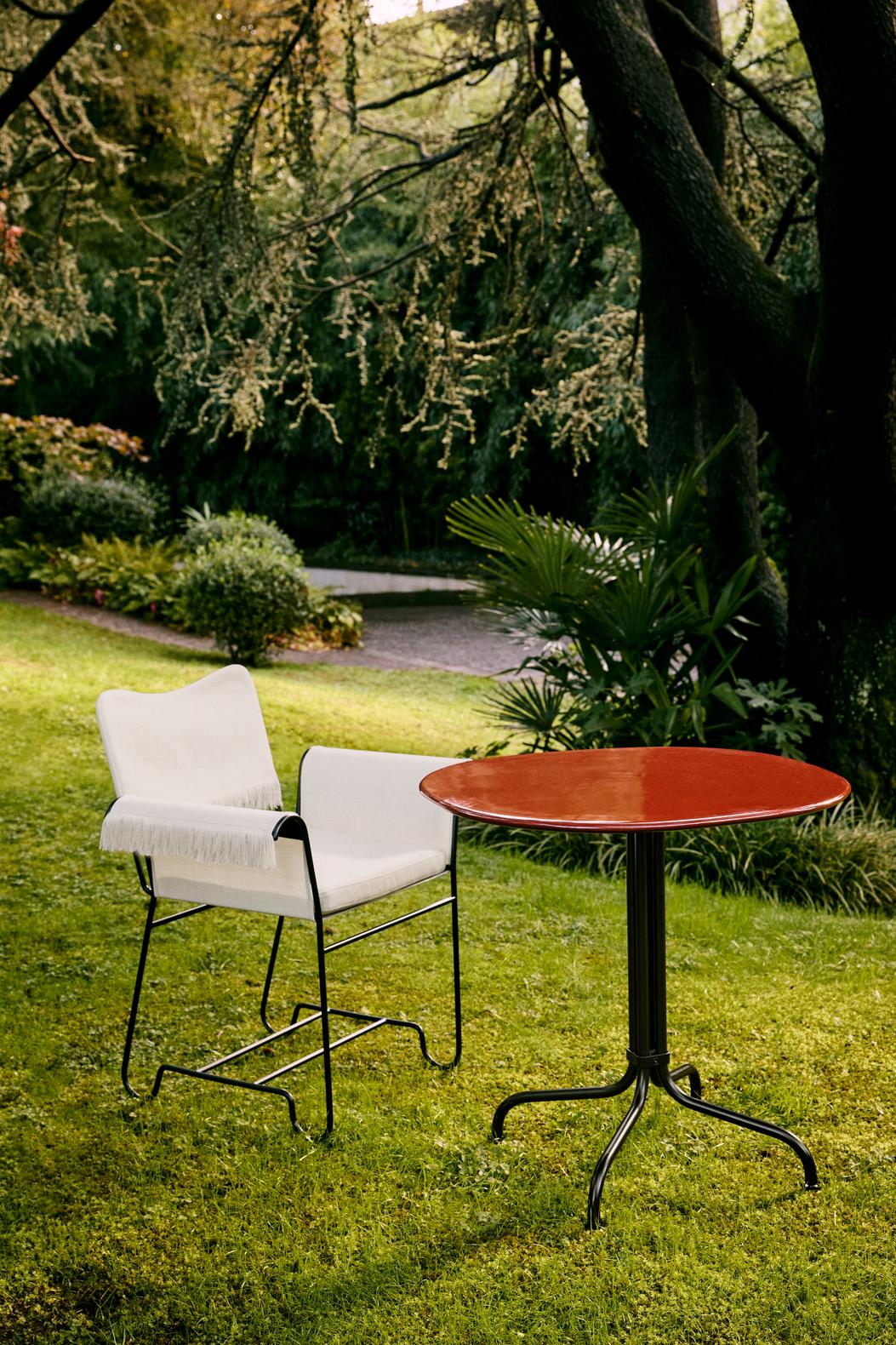 TROPIQUE cream garden chair with a white steel base