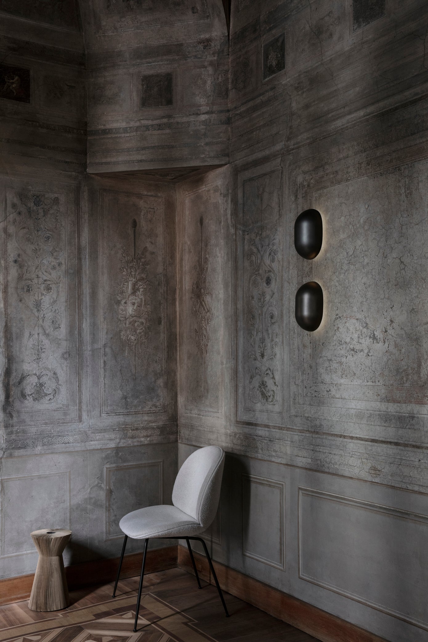 BEETLE upholstered chair with a black steel base