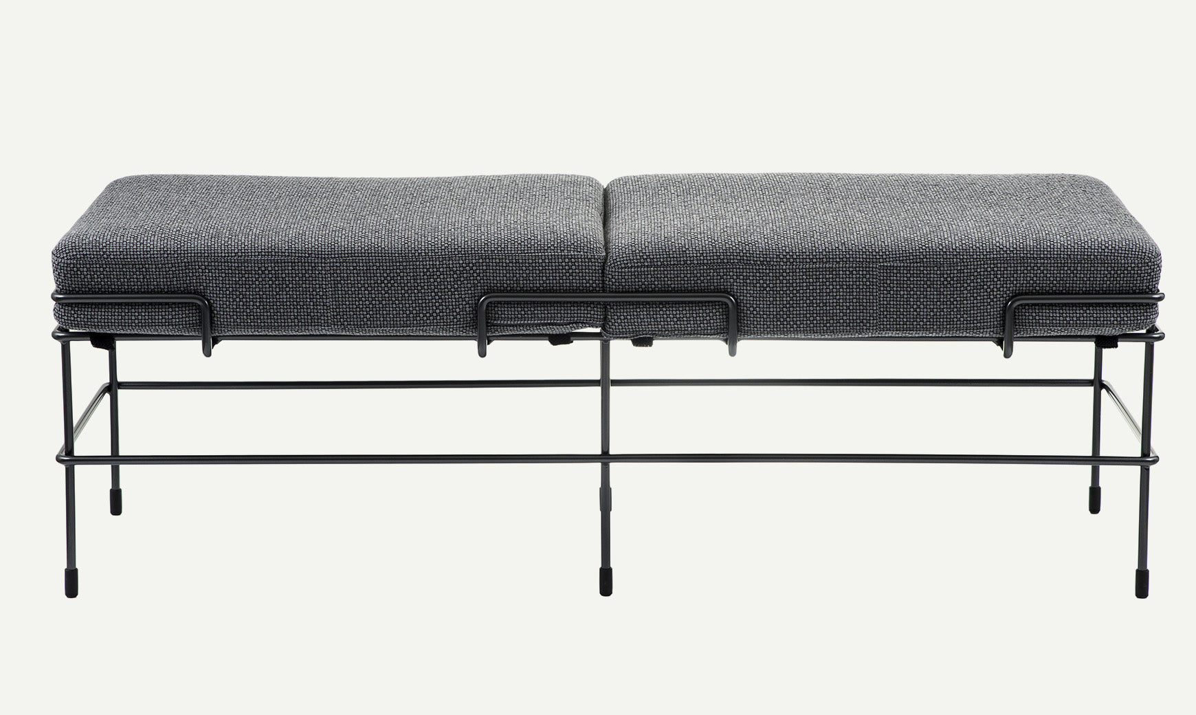 TRAFFIC upholstered bench with a black steel base