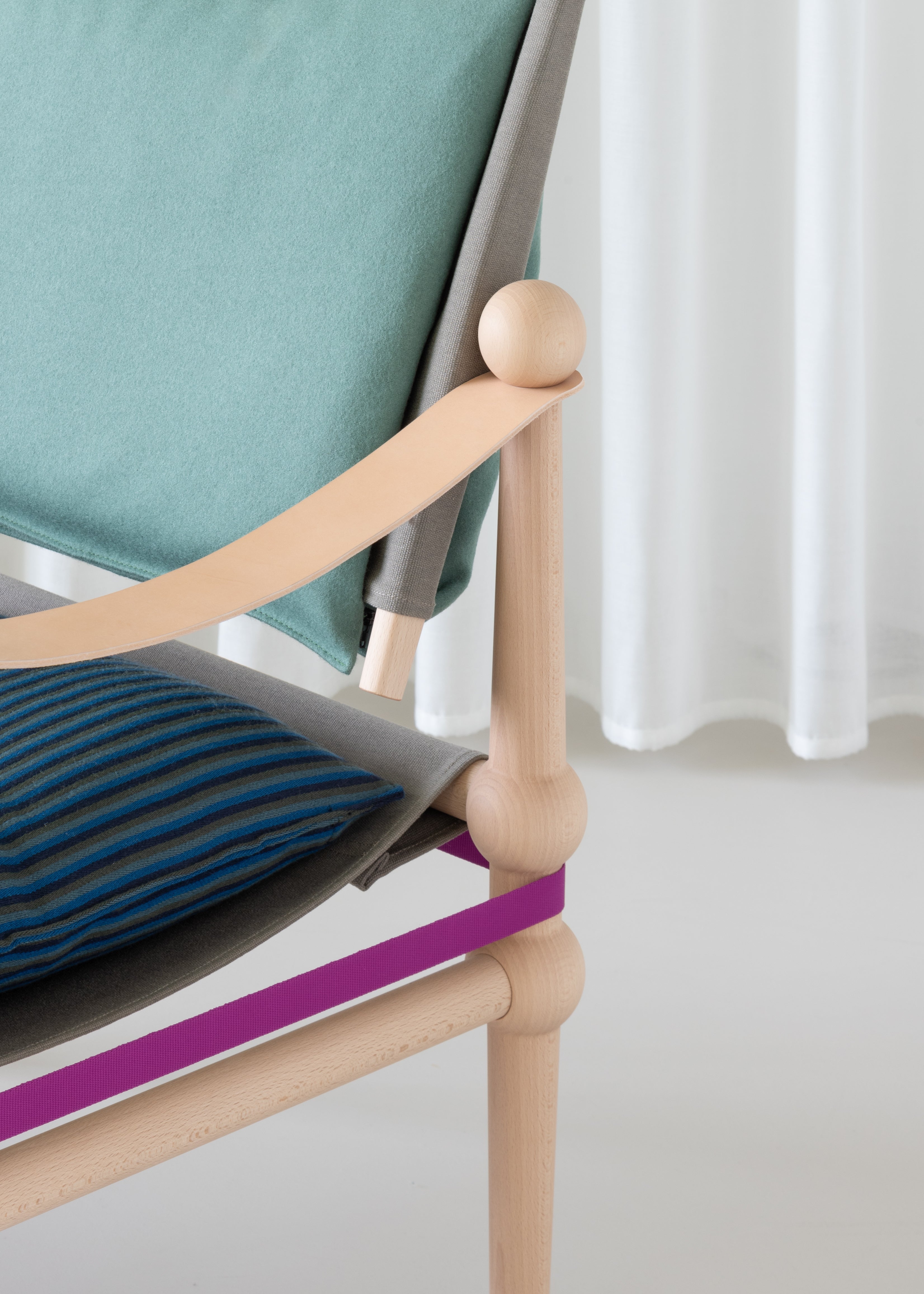 TWAIN armchair in blue with a light beech base