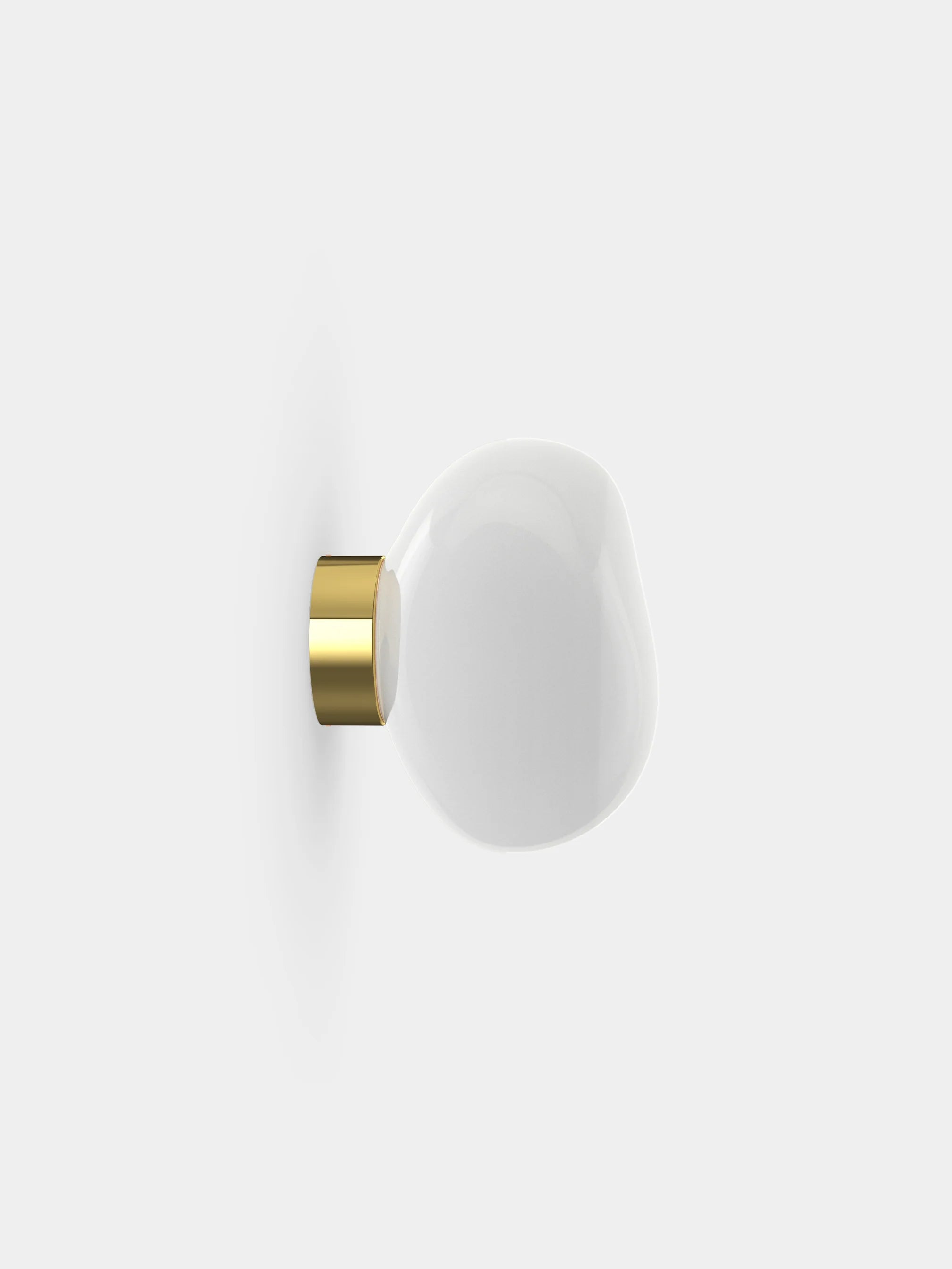 Melt wall lamp with a golden finish