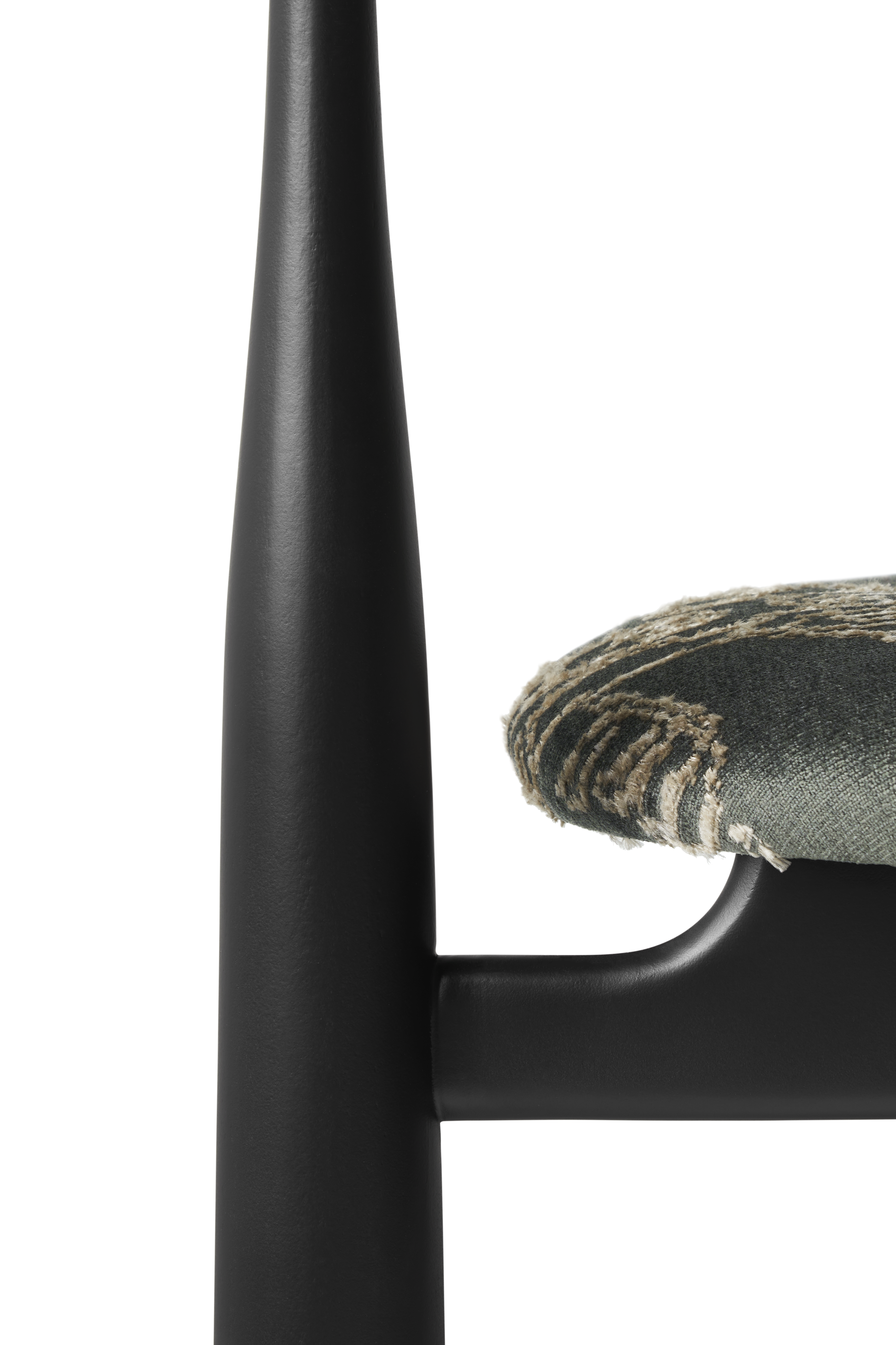 Bukowski chair upholstered with a black beech base