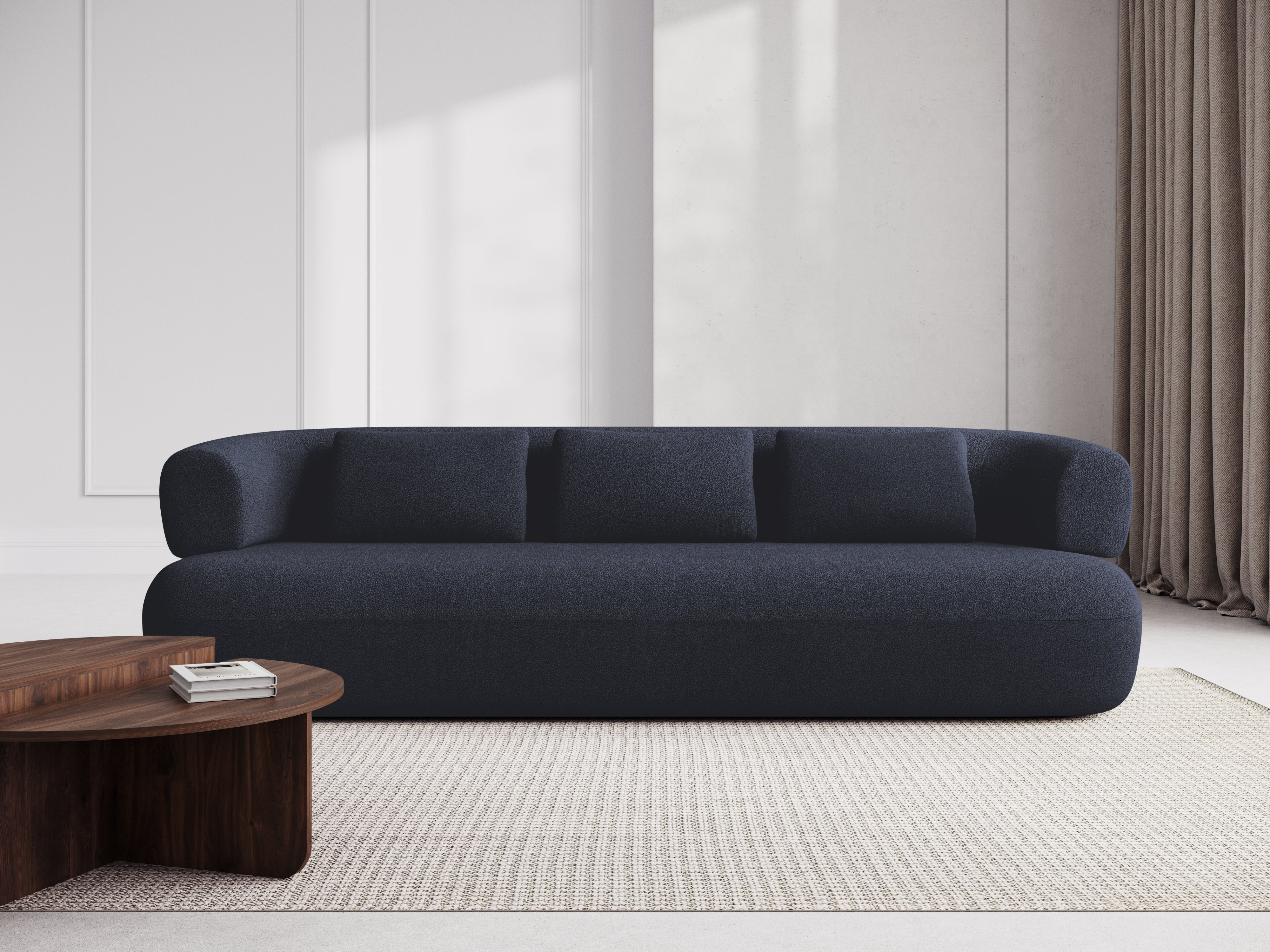 Sofa pro 3,5 osoby ALDRIN v granátovém bouclé.