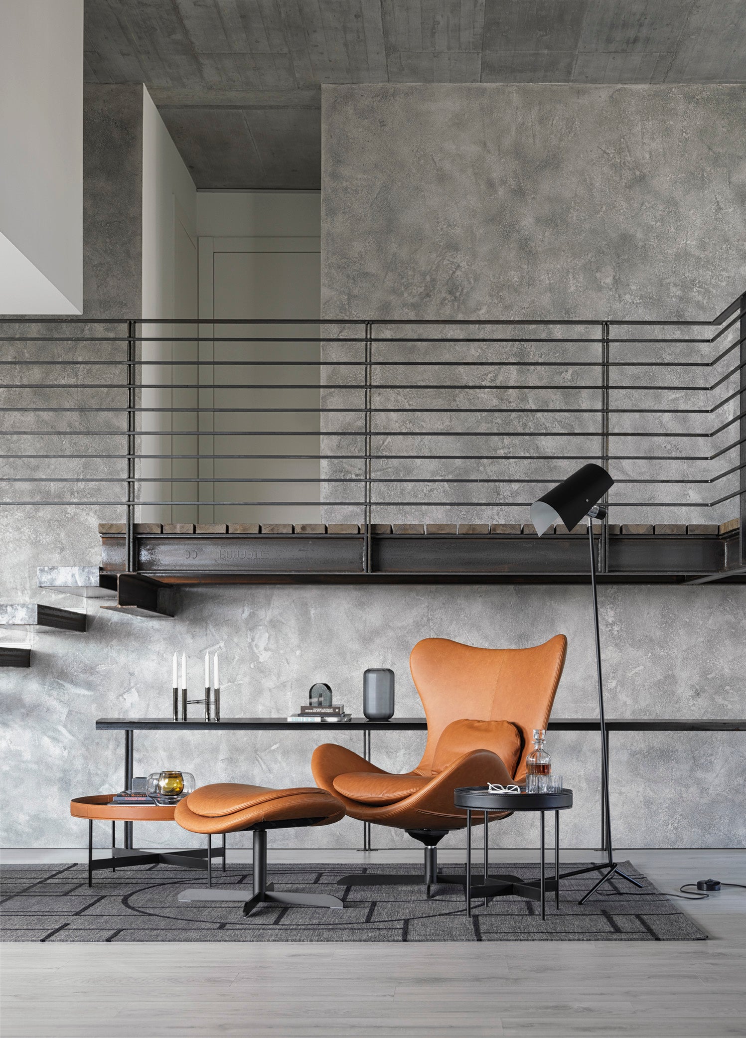 Křeslo otočné LAZY čalouněné s černým kovovým podstavcem