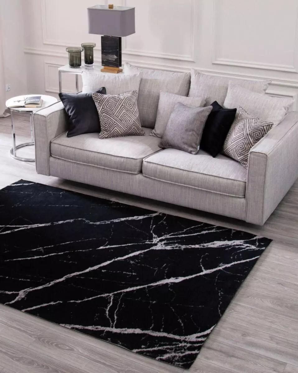 Dywan PIETRA czarny z kremowym wykończeniem Carpet Decor Eye on Design