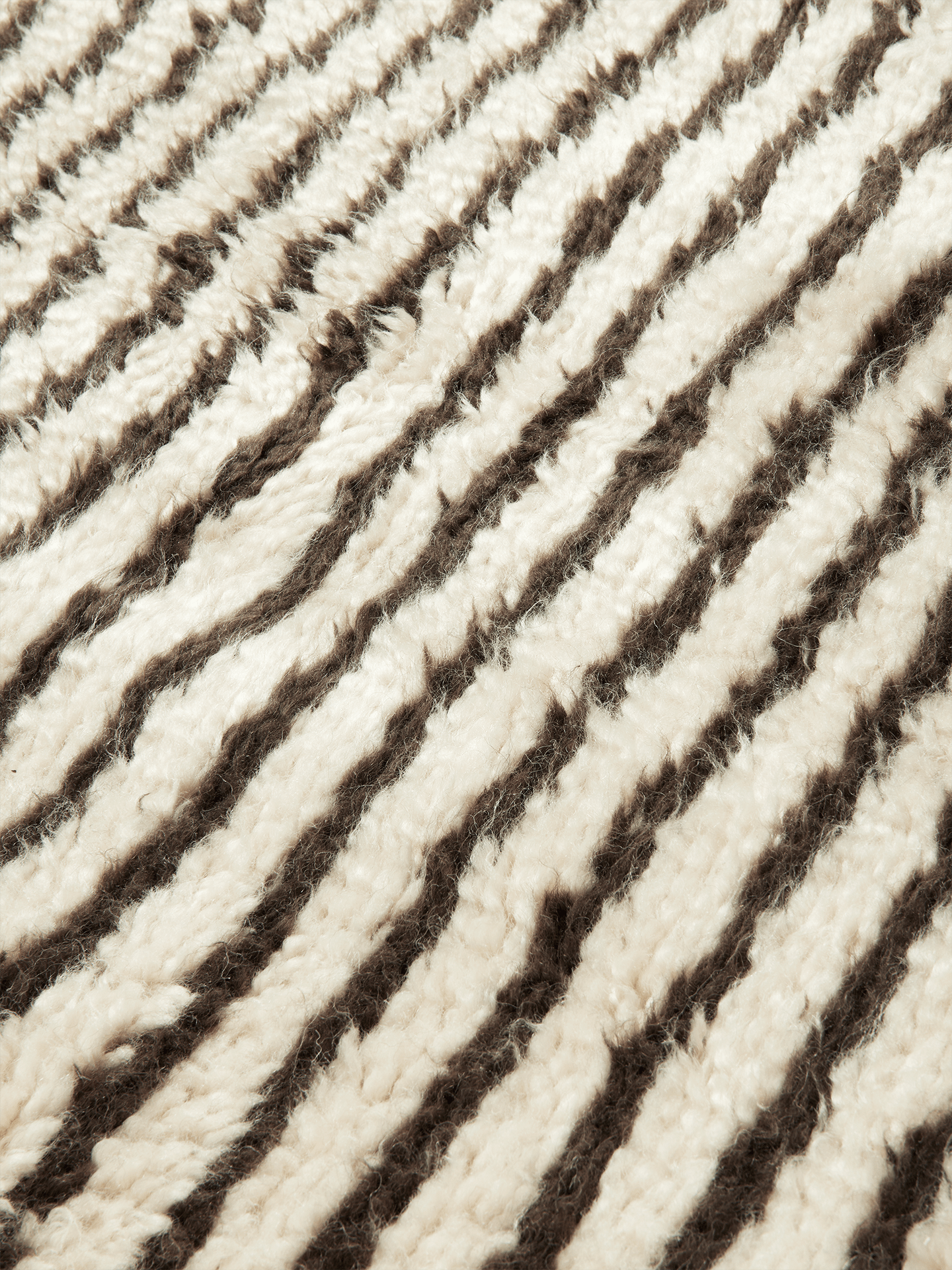 KAMI KNOTTED brown rug with long pile and beige