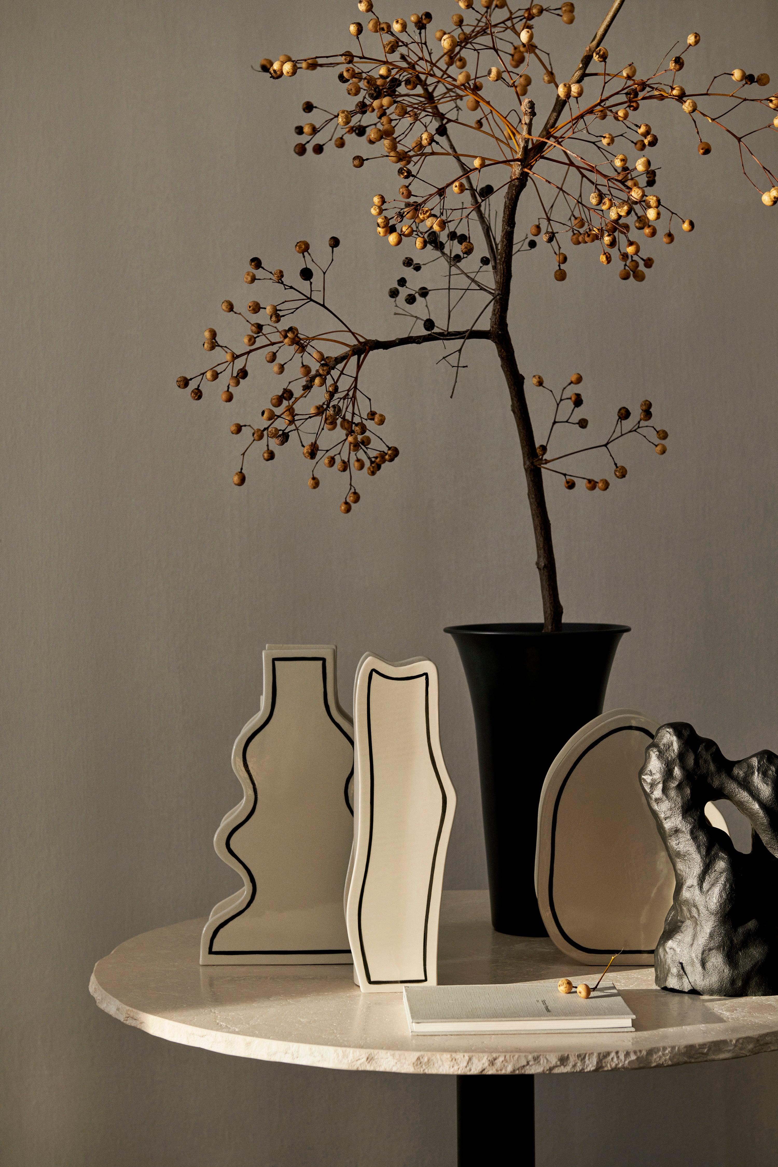 PASTE VASE CURVY vase in broken white with a black pattern