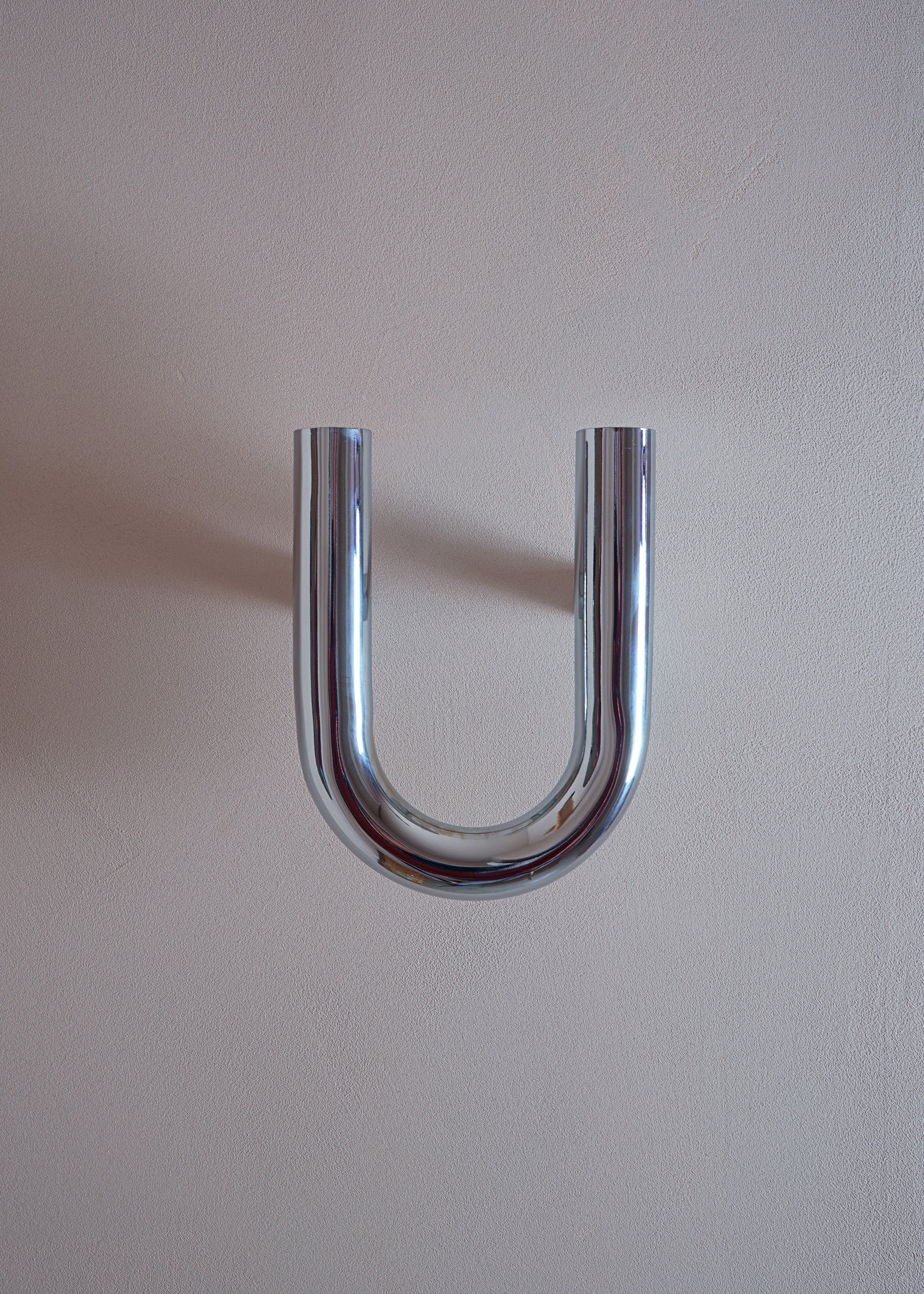 UNE chrome wall hanger