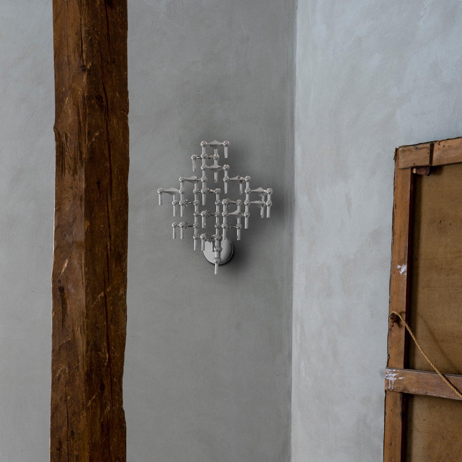 Świecznik ścienny STOFF NAGEL chrom Stoff Nagel Eye on Design