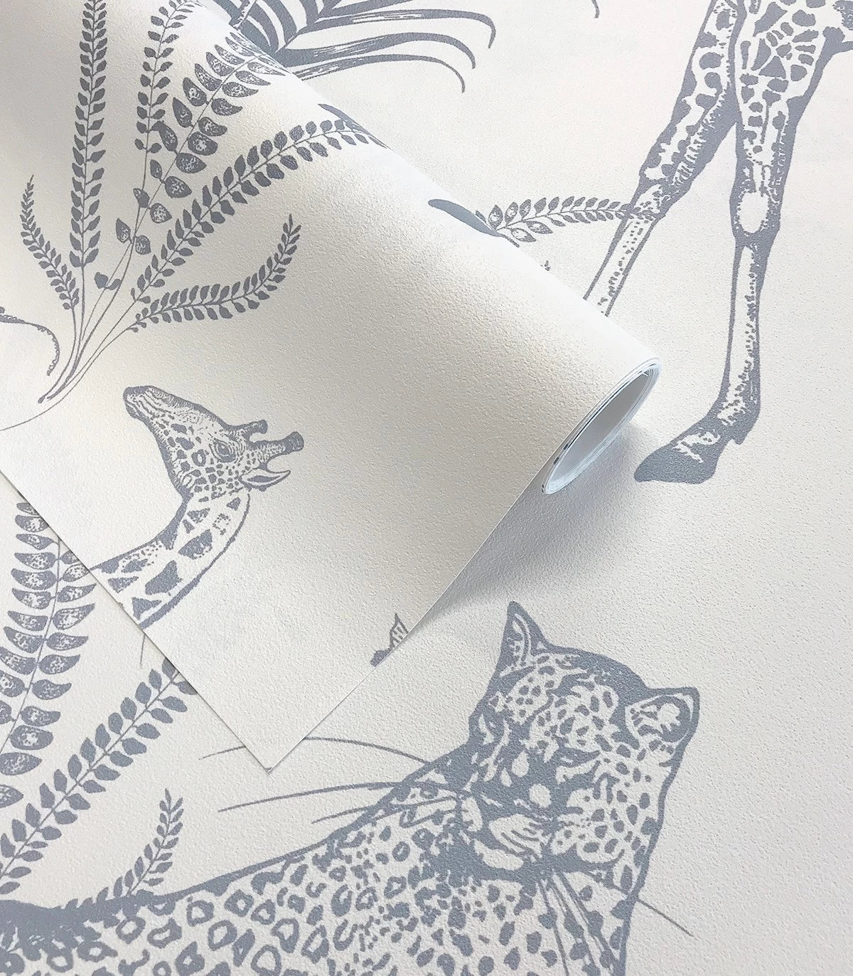 Safari Blue Animal Pattern Wallpaper in Light Blue with White