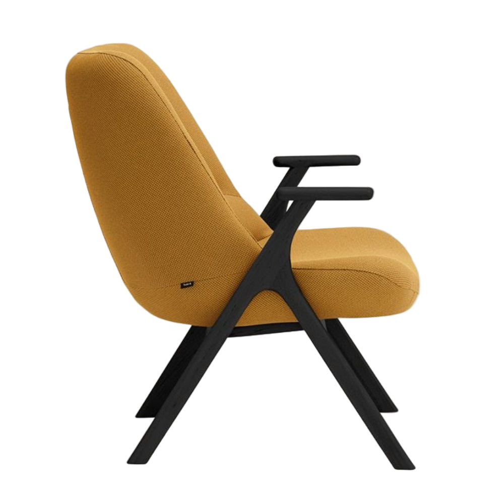 DINS mustard armchair with a black wooden base