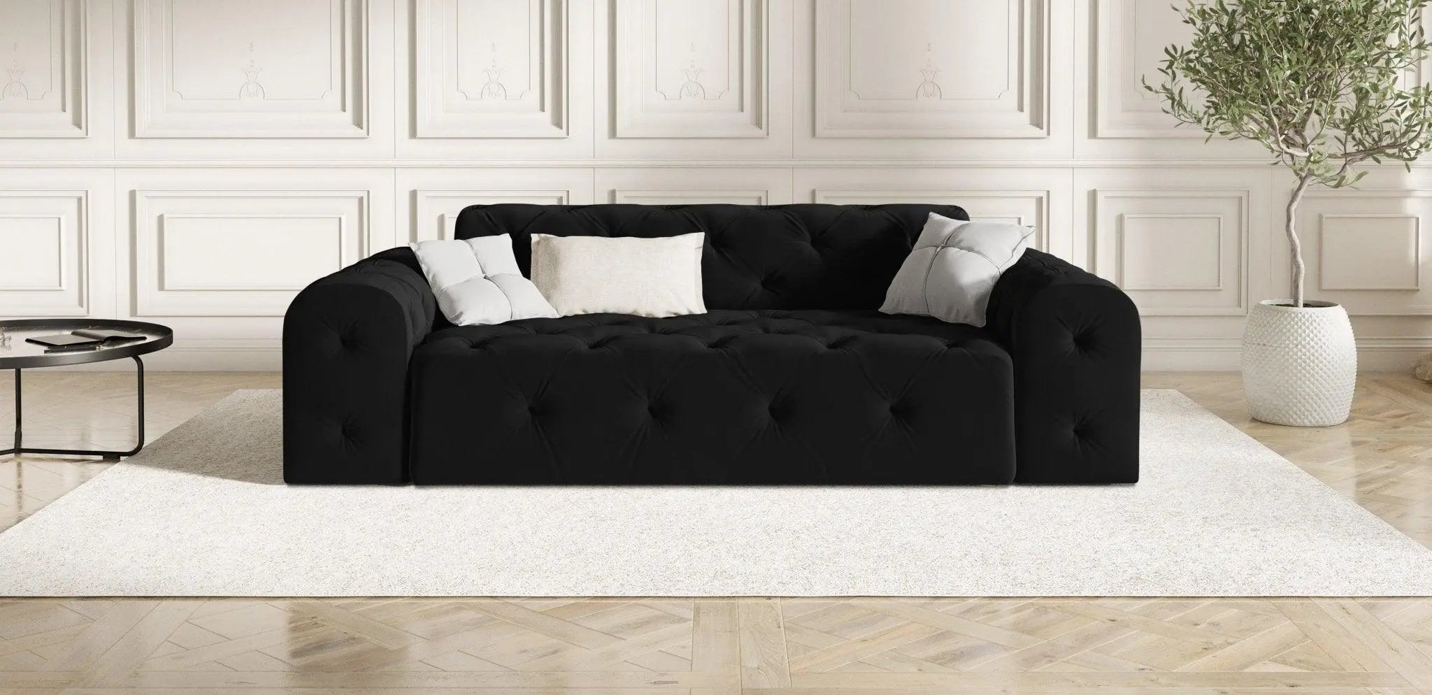 Sofy czarne w eleganckiej aranżacji salonu