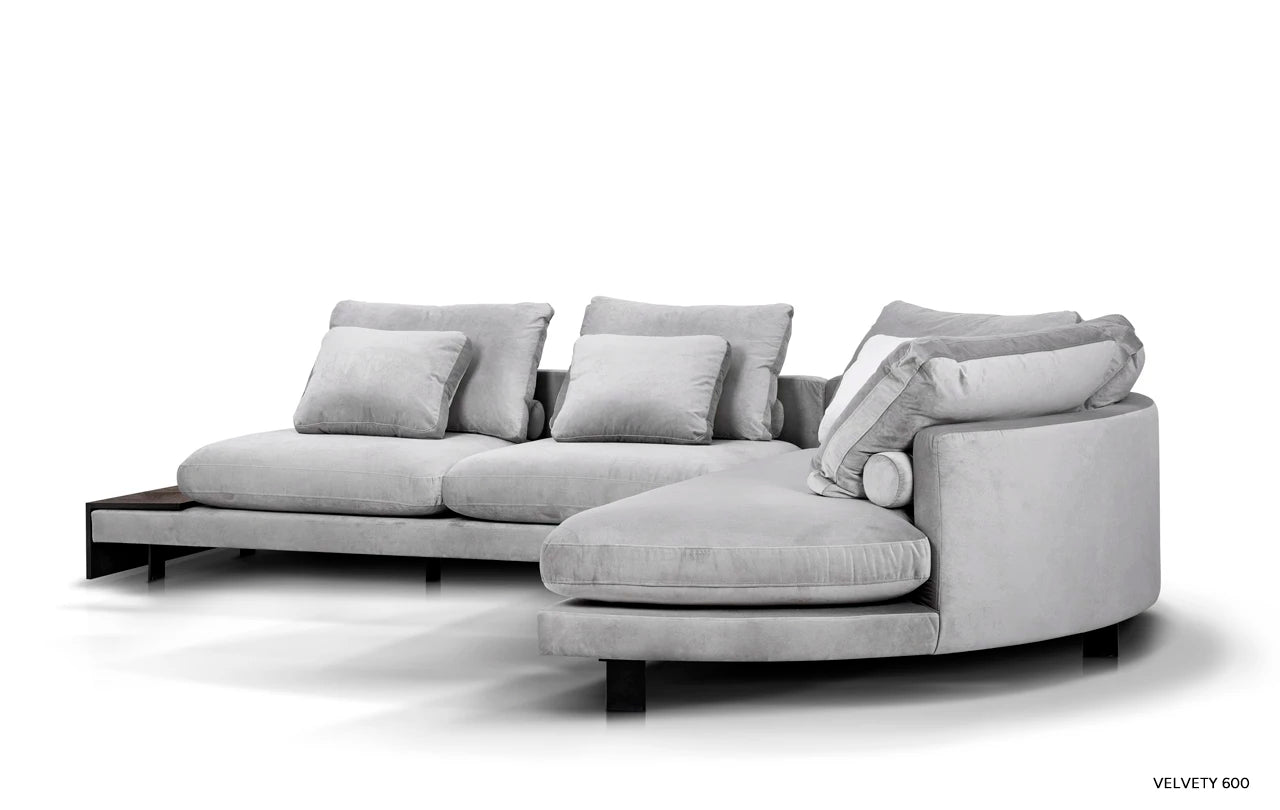 Zaoblený rohový gauč s pravostrannou policí DUMBO čalouněný