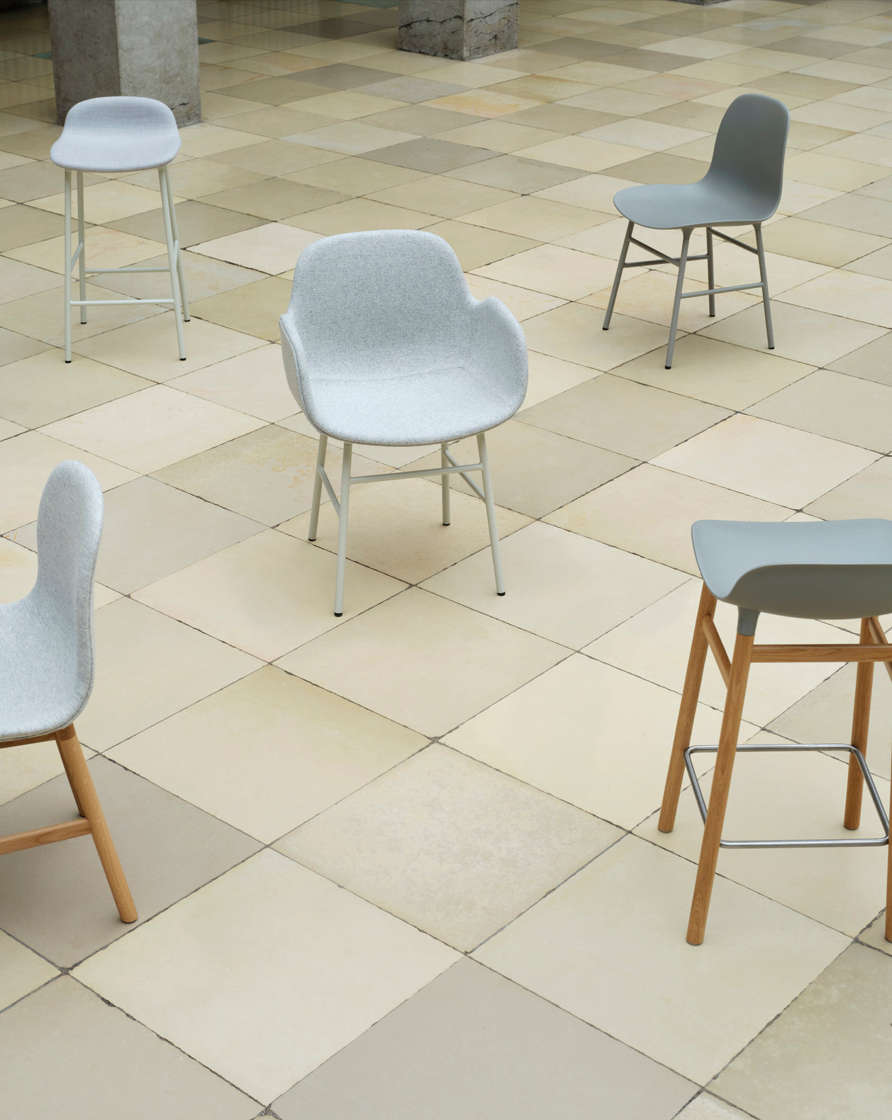 Hocker forms warm gray with a black oak base