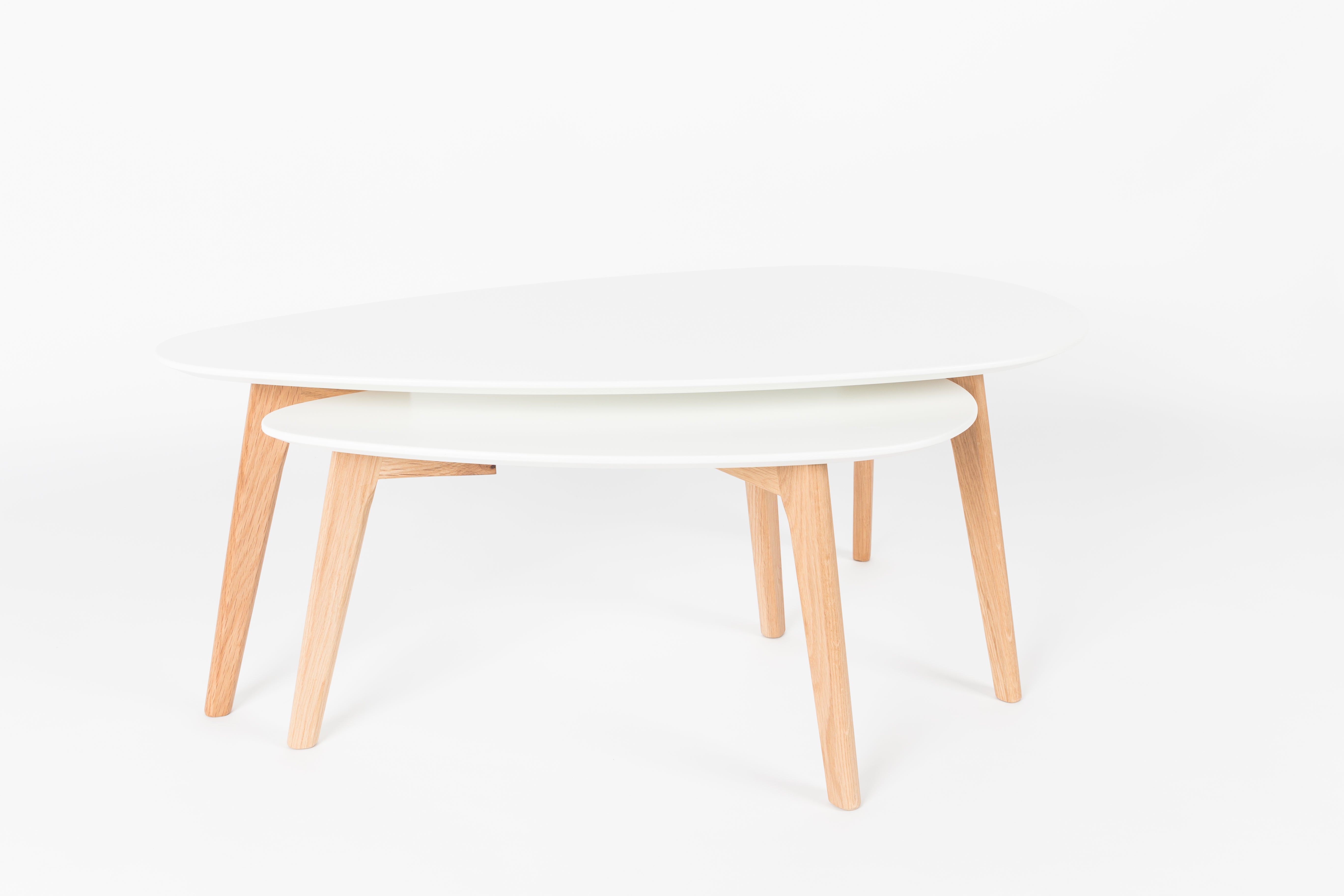 A set of white drop tables with a wooden base