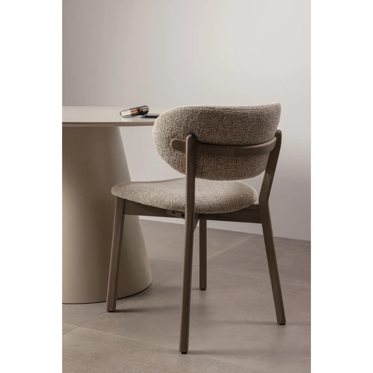 UDAR chair in gray-brown with a dark brown wooden base